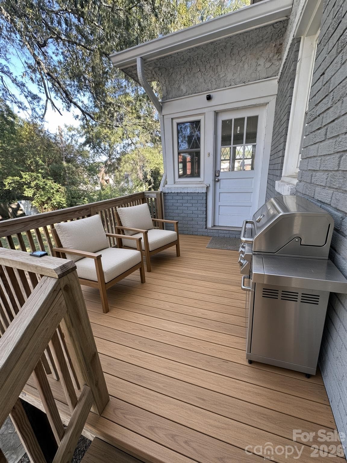 AI staged back deck - 2709 N Main Avenue, Newton