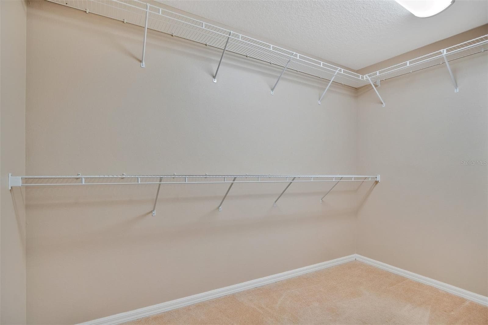 Primary bedroom closet - 469 CAREY WAY, ORLANDO