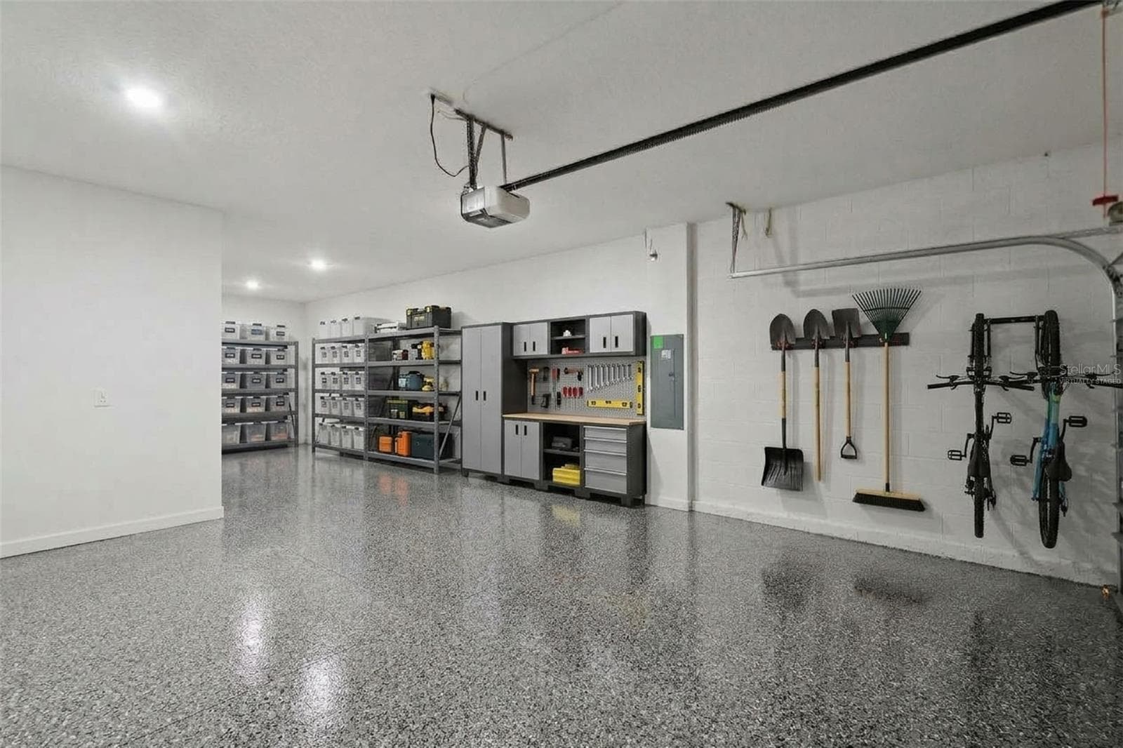 Virtually staged 3 car tandem garage 10'11" x 19' and 20' x 20'7" - 6175 SHAVASANA RD RD, CLERMONT