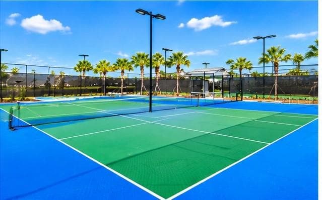 Well maintained tennis courts for residents to enjoy - 6175 SHAVASANA RD RD, CLERMONT