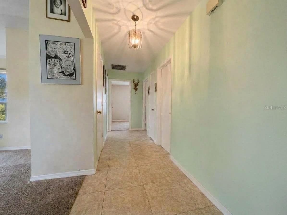 Entryway | Welcoming front entry leading into the home's bright and functional living spaces. - 23088 GRAY AVE, PORT CHARLOTTE