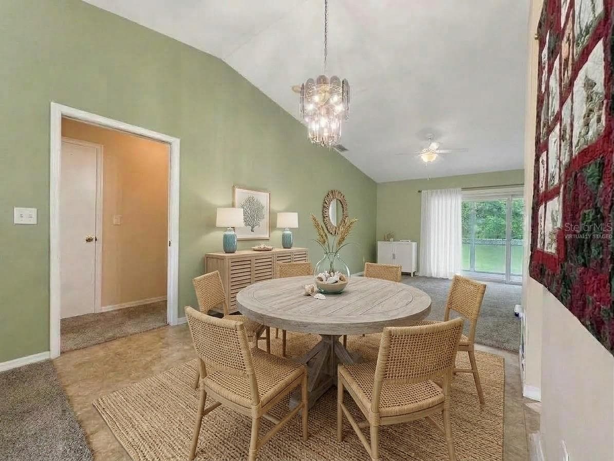 Dining Area | Virtually Staged | Dedicated dining space conveniently positioned just off the kitchen. Photo has been virtually staged. - 23088 GRAY AVE, PORT CHARLOTTE