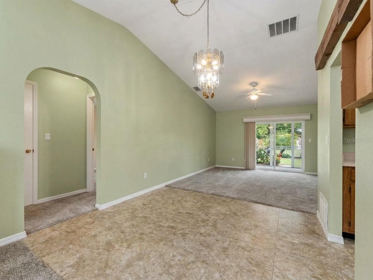 Dining Area | Another view of the dining area and its connection to the surrounding living spaces. - 23088 GRAY AVE, PORT CHARLOTTE