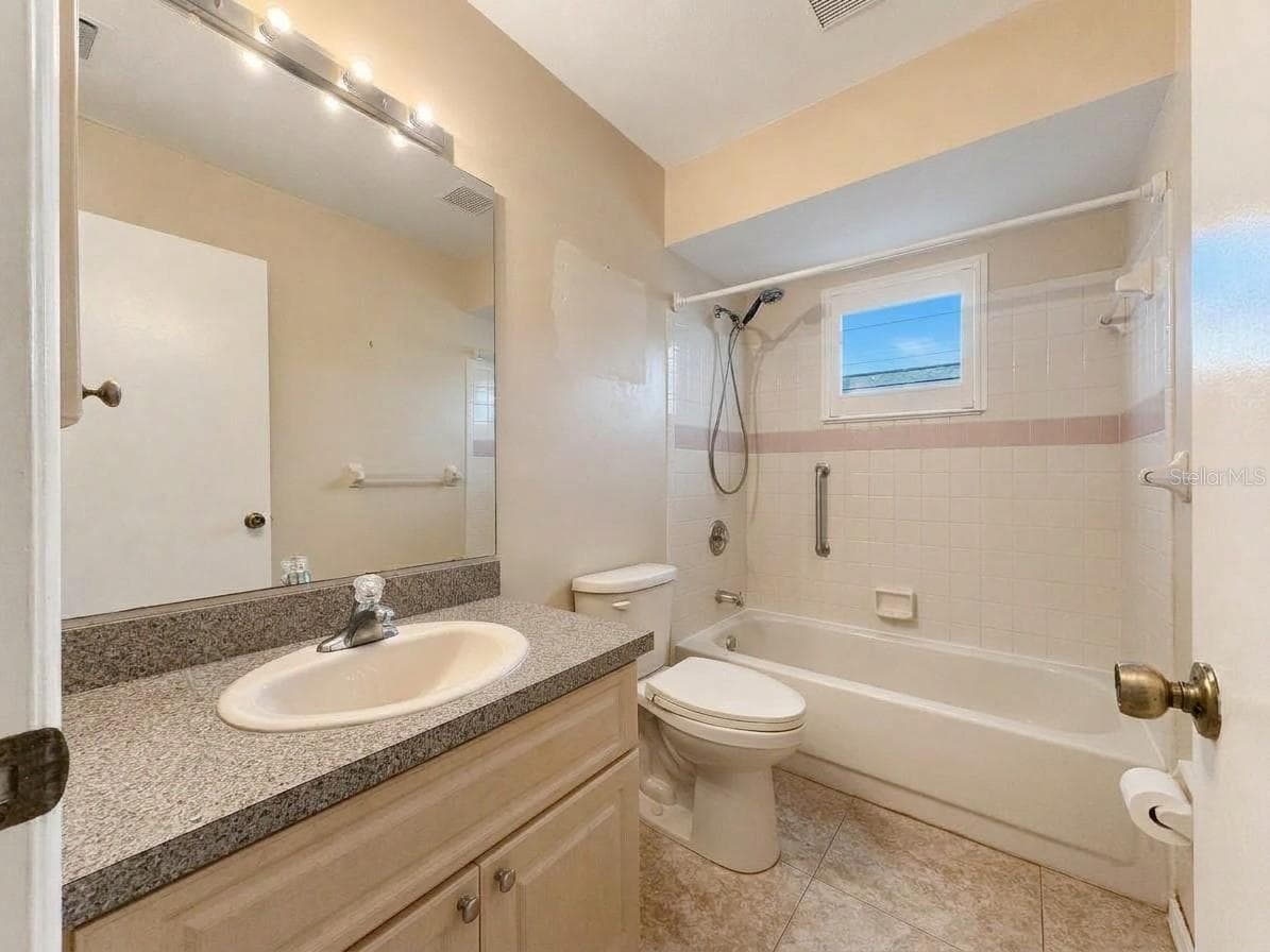 Guest Bathroom | Additional view of the guest bathroom conveniently located near the secondary bedrooms. - 23088 GRAY AVE, PORT CHARLOTTE