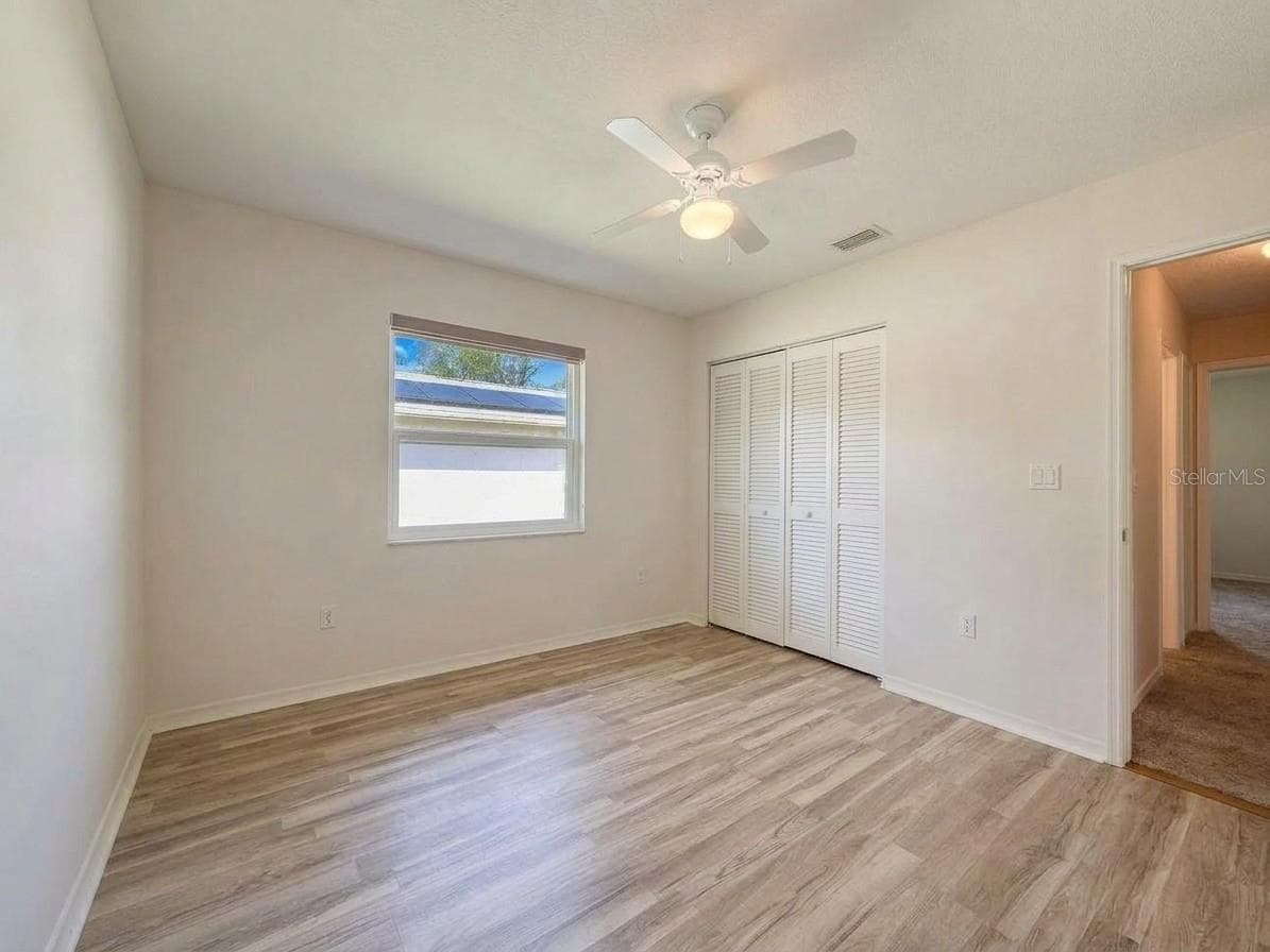 Guest Bedroom | Additional secondary bedroom completing the home's functional split bedroom floor plan. - 23088 GRAY AVE, PORT CHARLOTTE