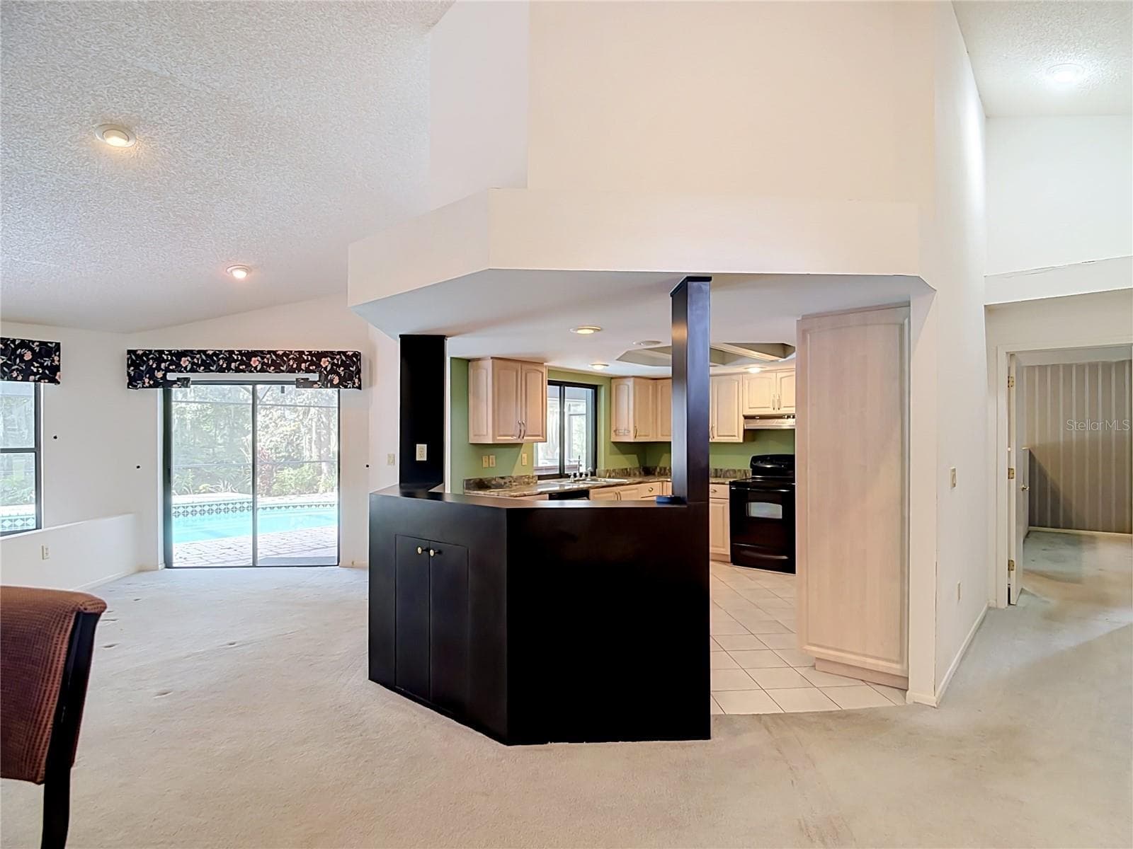 View from foyer into kitchen & great room - 3305 IMPERIAL LN, LAKELAND