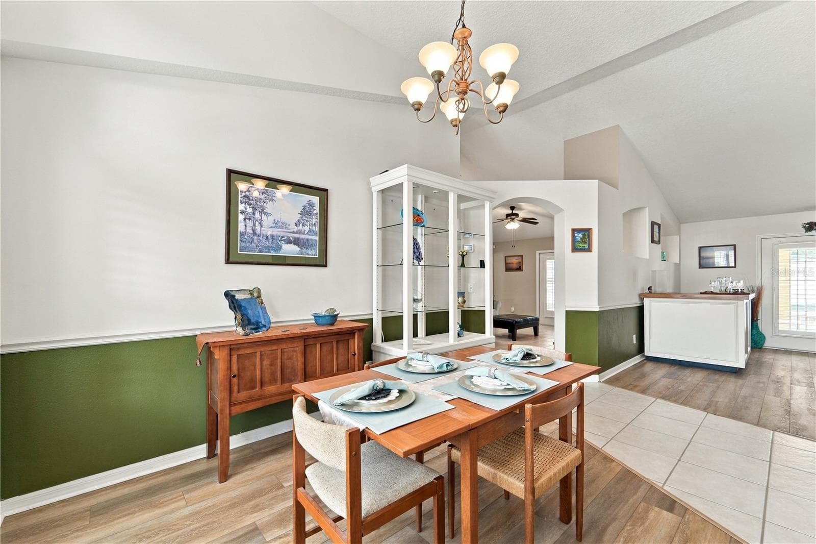 View of dining room and living room from foyer - 1420 BENT OAKS BLVD, DELAND