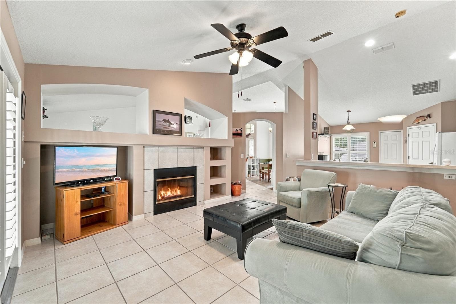 Picture from primary bedroom looking into family room, kitchen and breakfast nook - 1420 BENT OAKS BLVD, DELAND