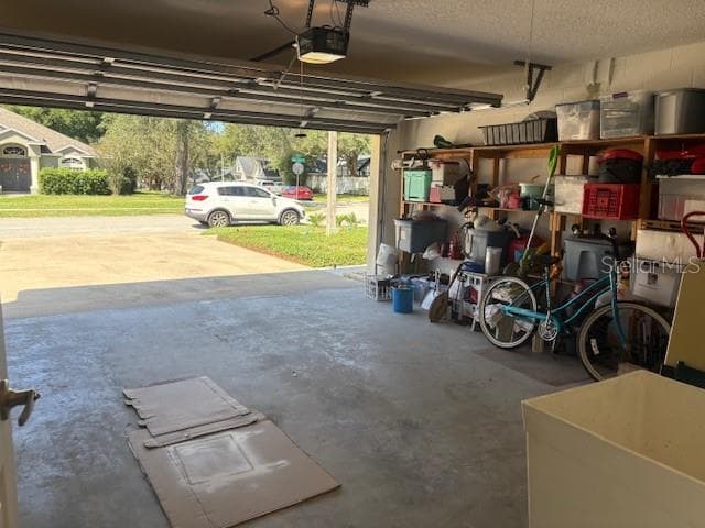 2-car garage with built in shelving and wash tub. - 1420 BENT OAKS BLVD, DELAND