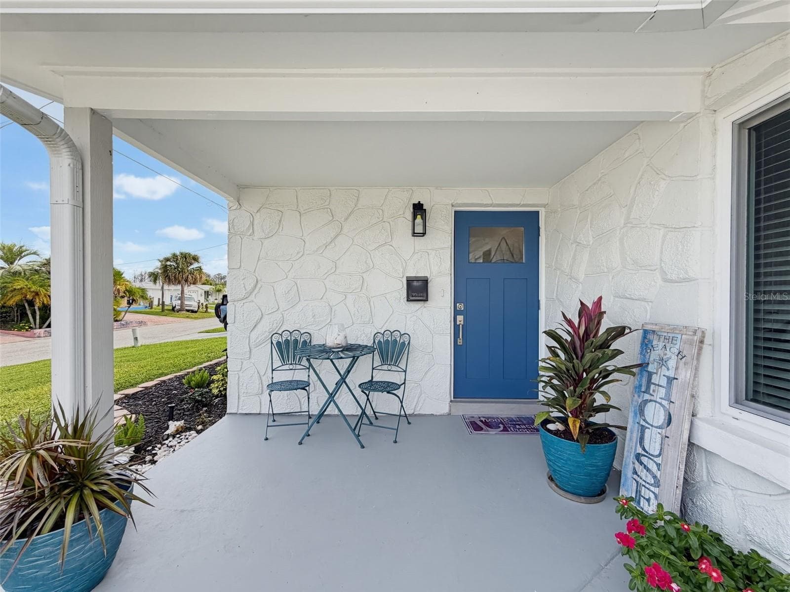 COVERED FRONT PORCH... - 6618 LEESIDE ISLE, HUDSON