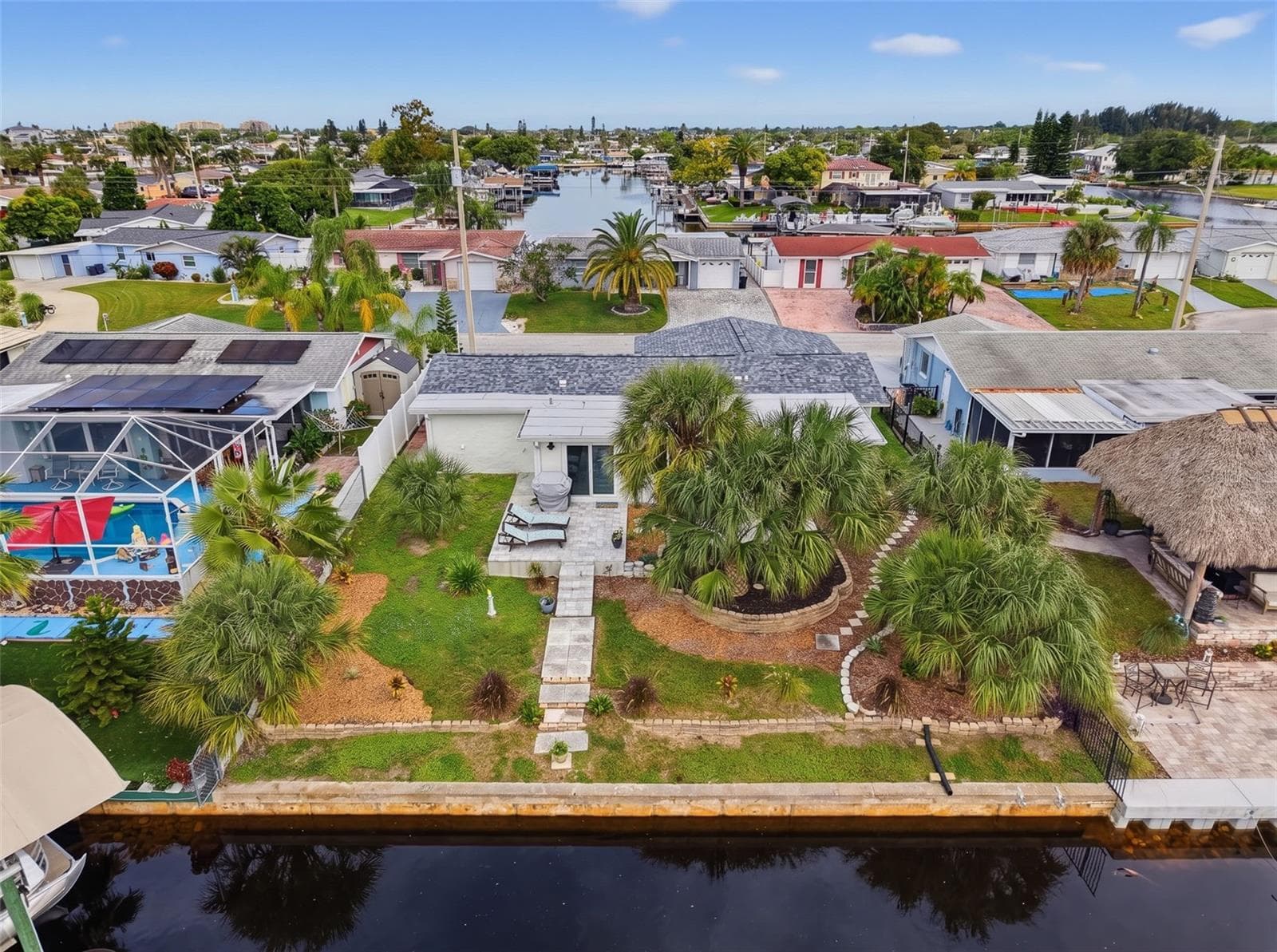 MATURE LANDSCAPING SHOWCASES THE BACKYARD - 6618 LEESIDE ISLE, HUDSON