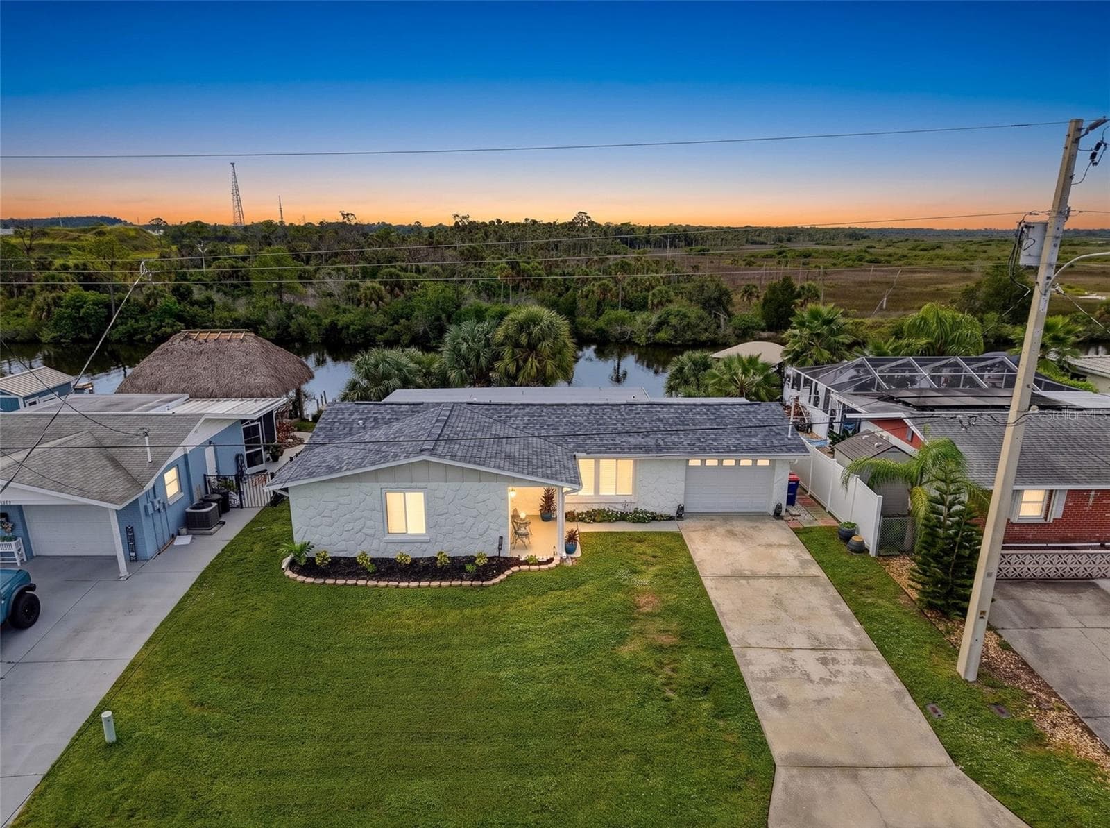 COME SEE THIS SPECIAL HOME IN PERSON. - 6618 LEESIDE ISLE, HUDSON