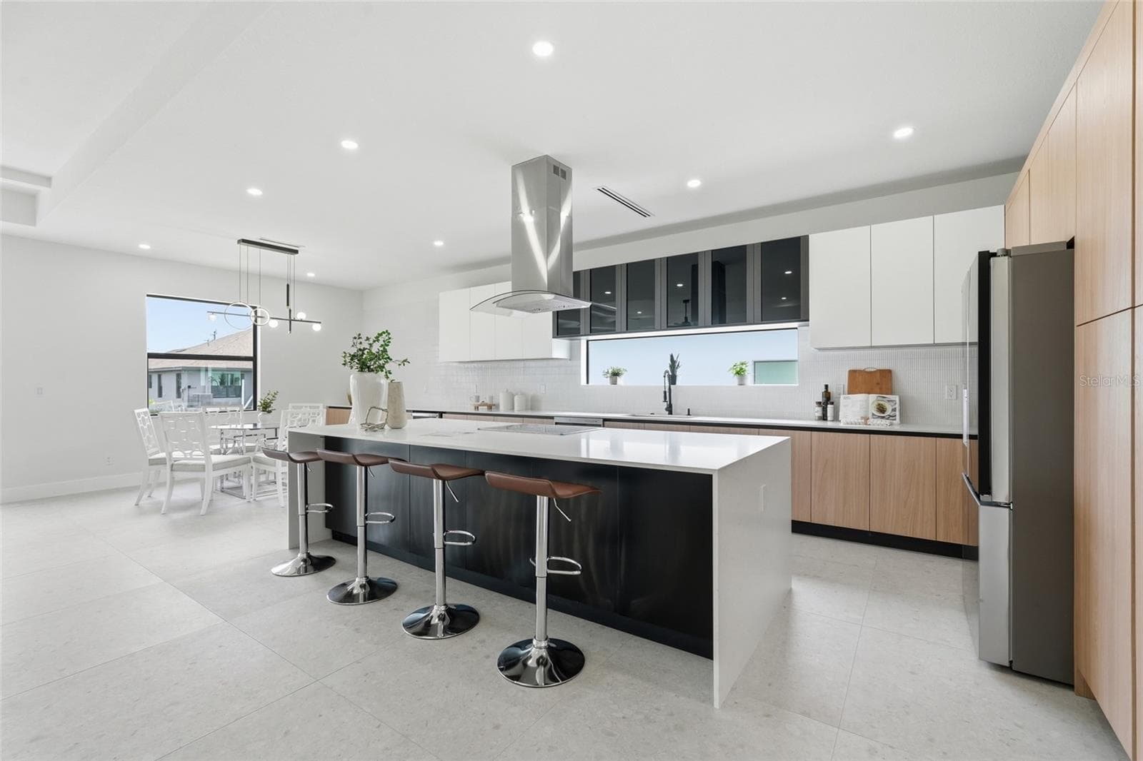 Kitchen Island offers additional storage space. - 325 NE 15TH TER, CAPE CORAL