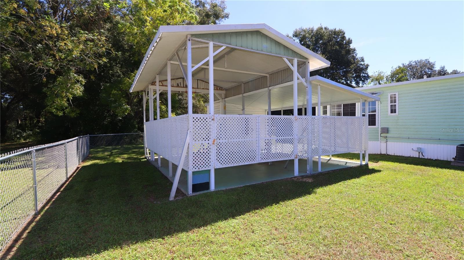 RV port in fenced yard... - 417 NE 64TH AVE, OCALA