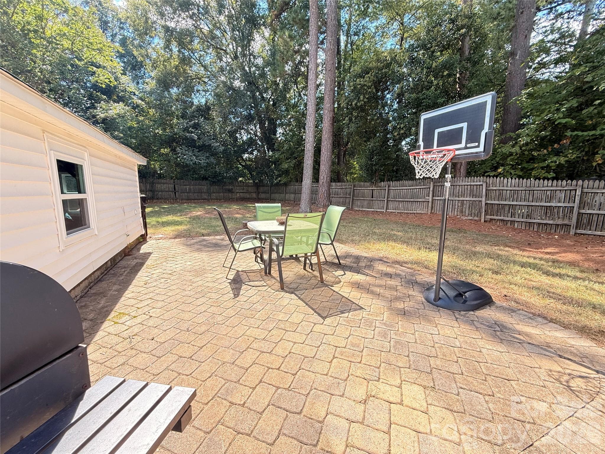 Patio Seating Area Overlooking the Yard - 1131 Richmond Drive, Rock Hill