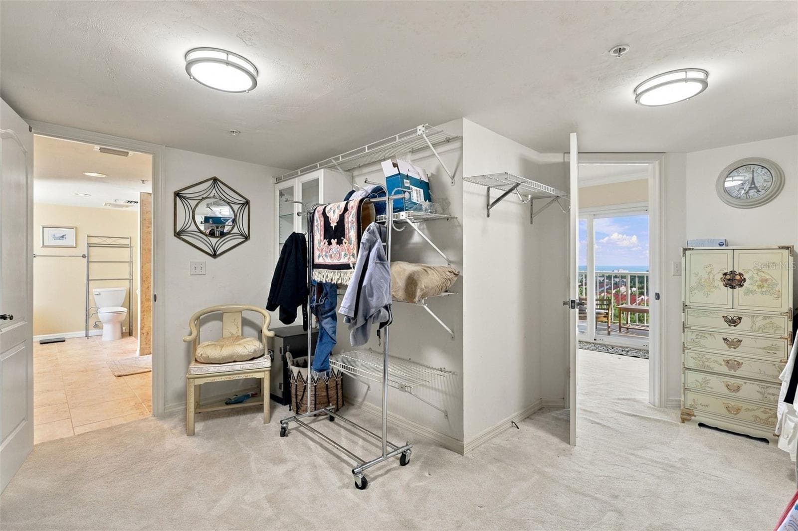 Upper level walk-in closet - 3 OCEANS WEST BLVD #7D7, DAYTONA BEACH SHORES