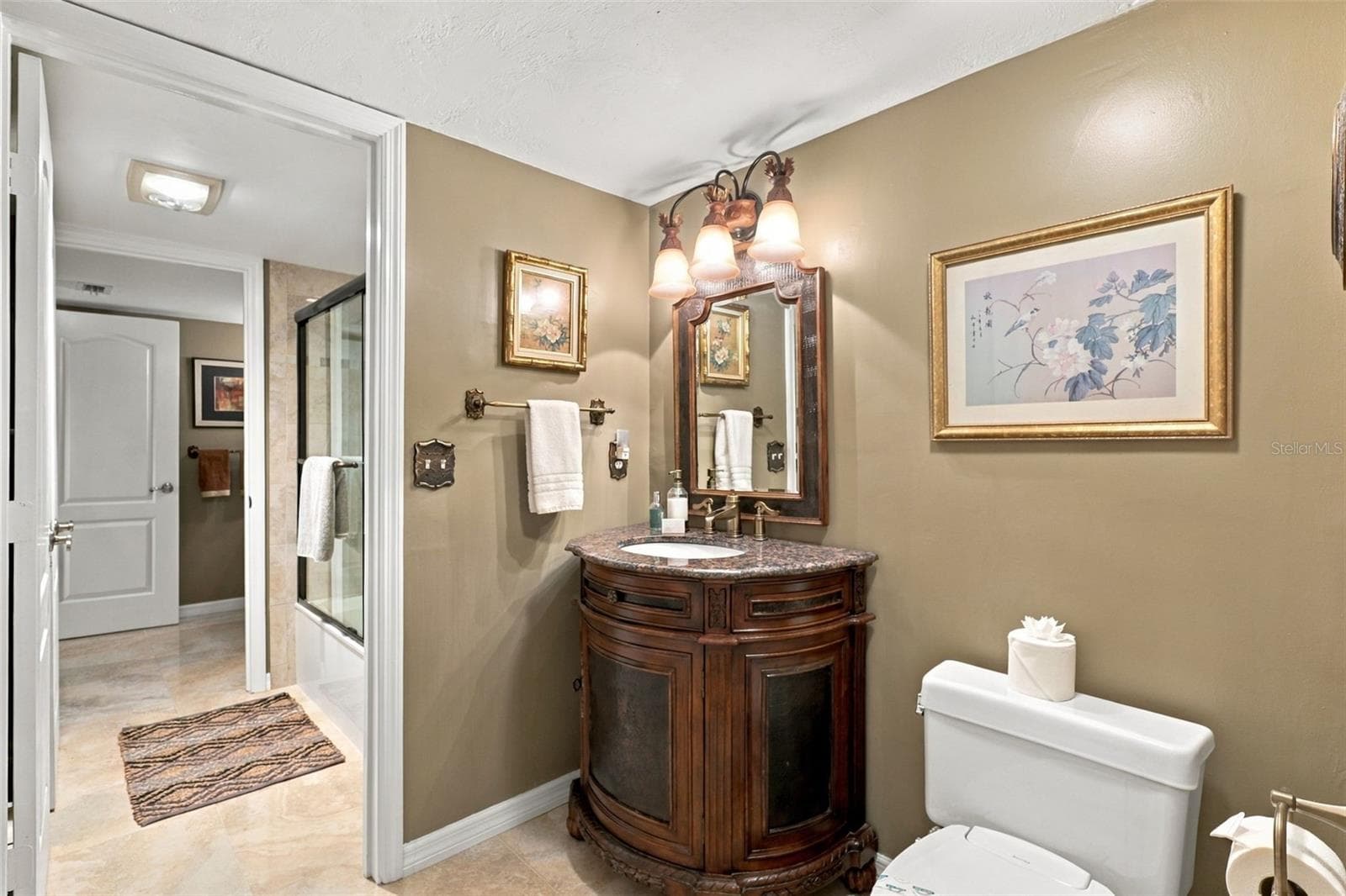 Main level guest bathroom - 3 OCEANS WEST BLVD #7D7, DAYTONA BEACH SHORES