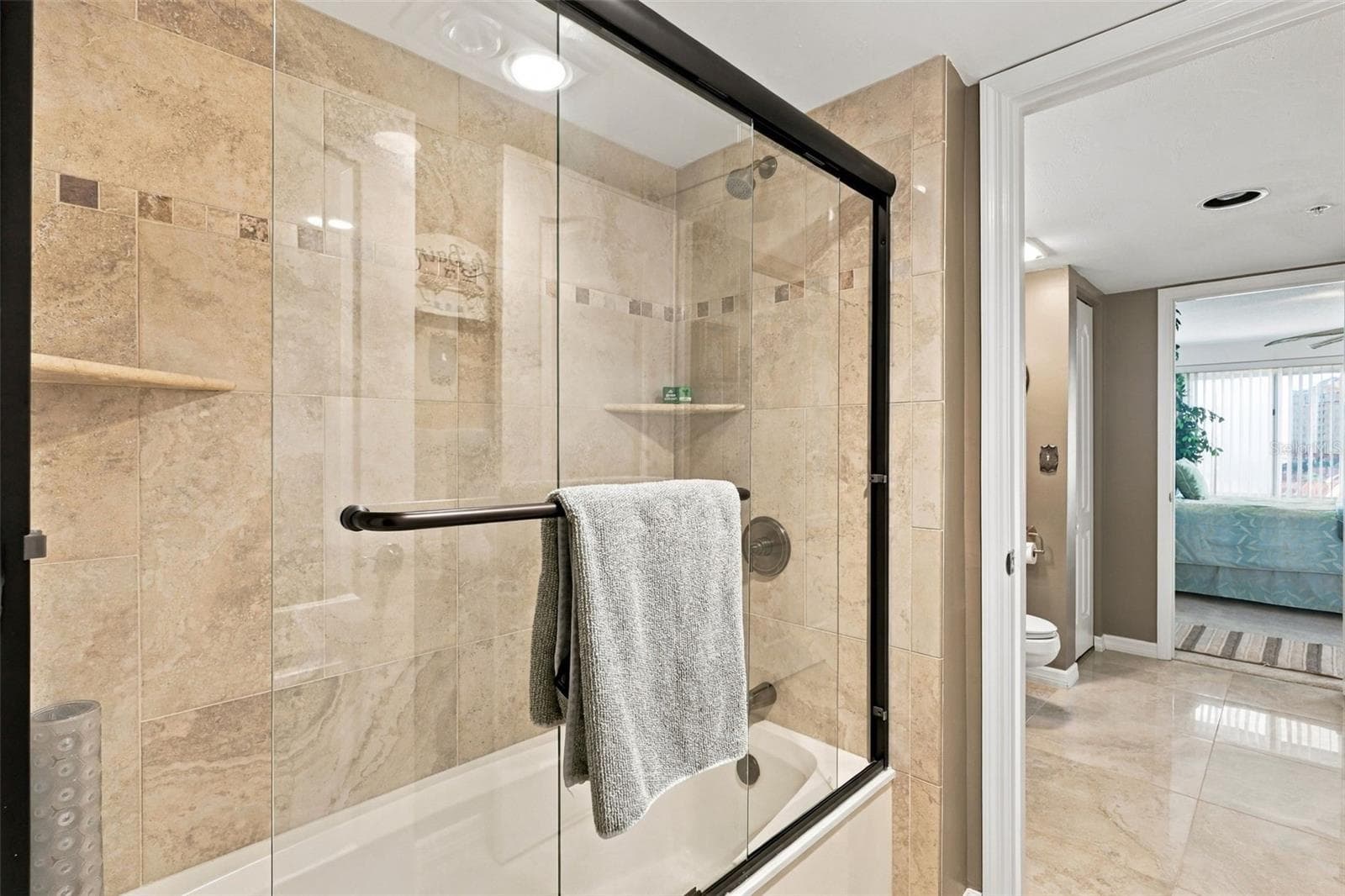 Main level guest bath/shower - 3 OCEANS WEST BLVD #7D7, DAYTONA BEACH SHORES