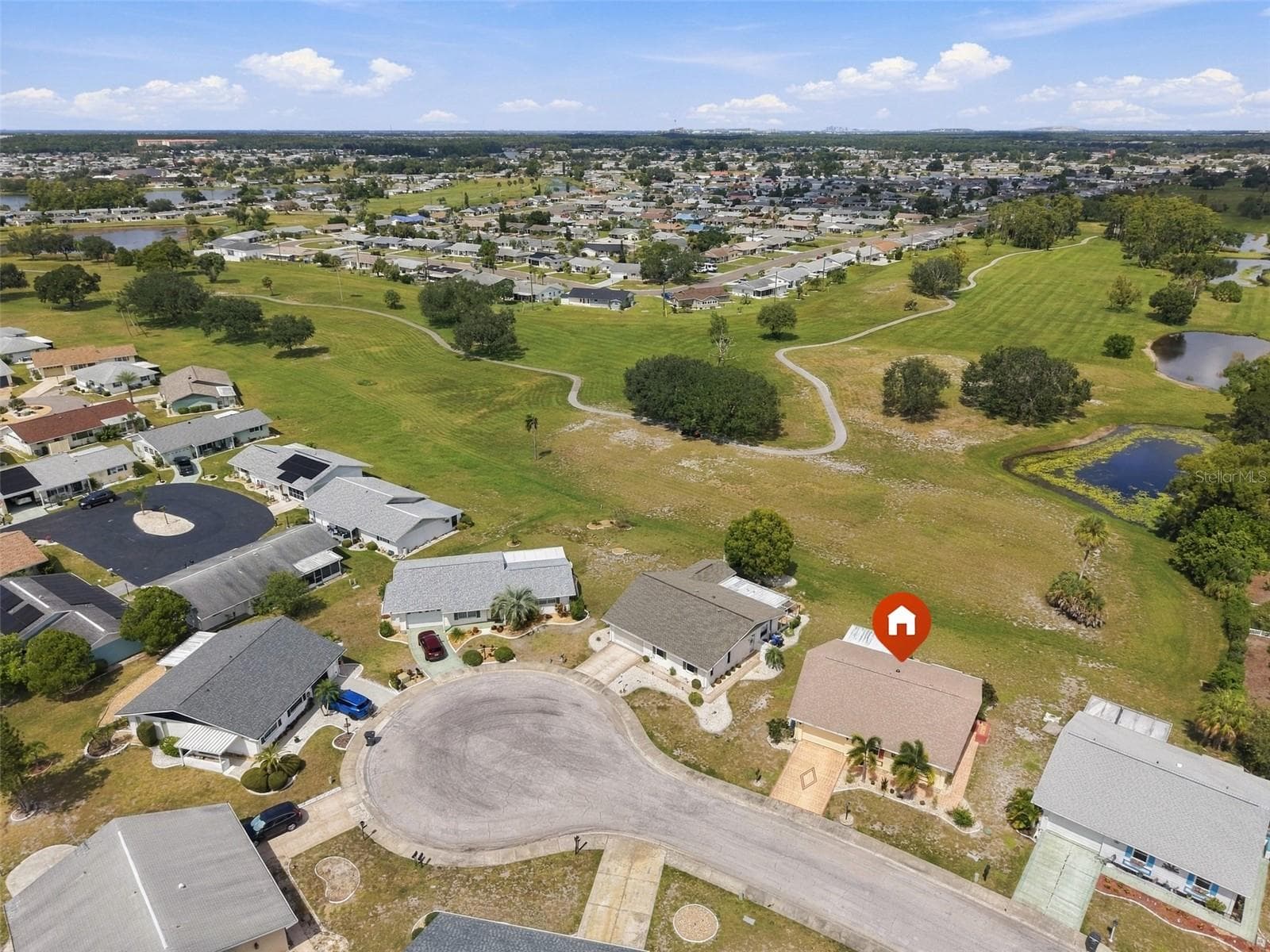 Located on a cul-de-sac, so no through traffic and peaceful days. - 215 GENET CT, SUN CITY CENTER