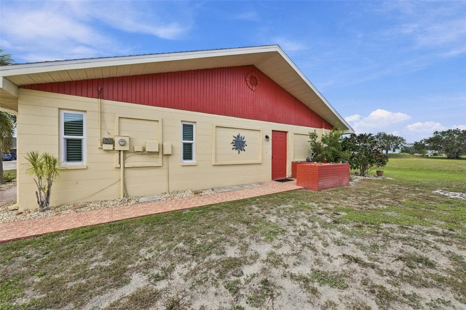 This is the sidewalk to the front door. - 215 GENET CT, SUN CITY CENTER