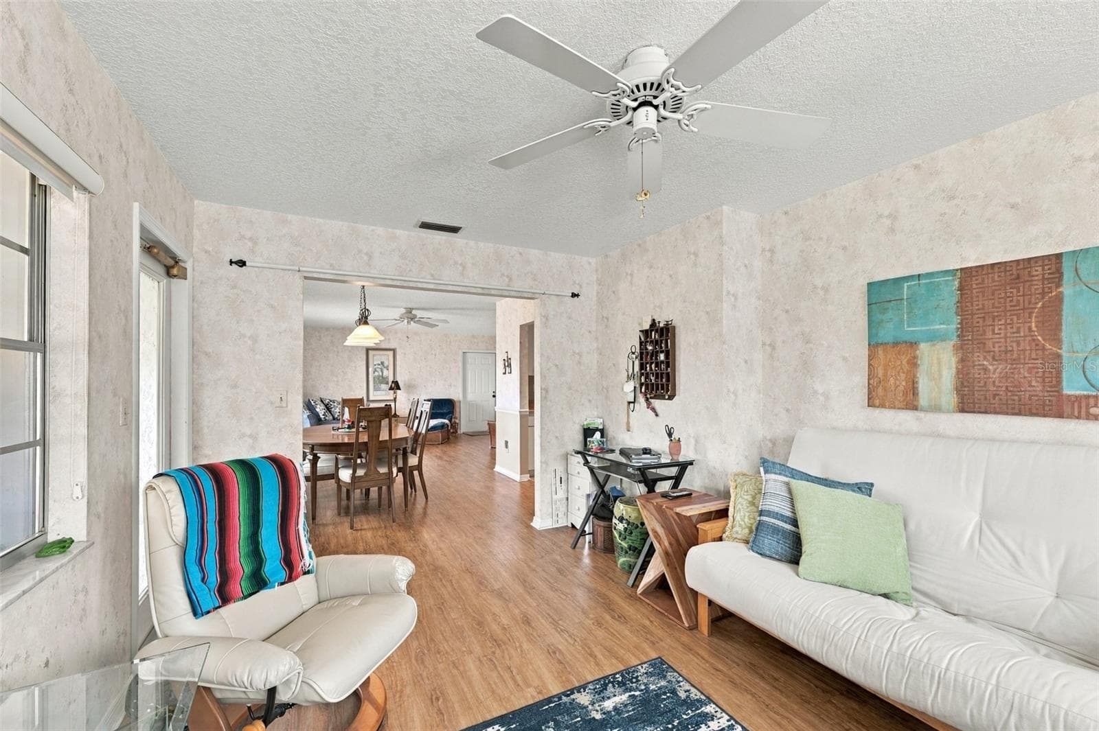 Tones are muted with a more natural feeling throughout the home. - 215 GENET CT, SUN CITY CENTER