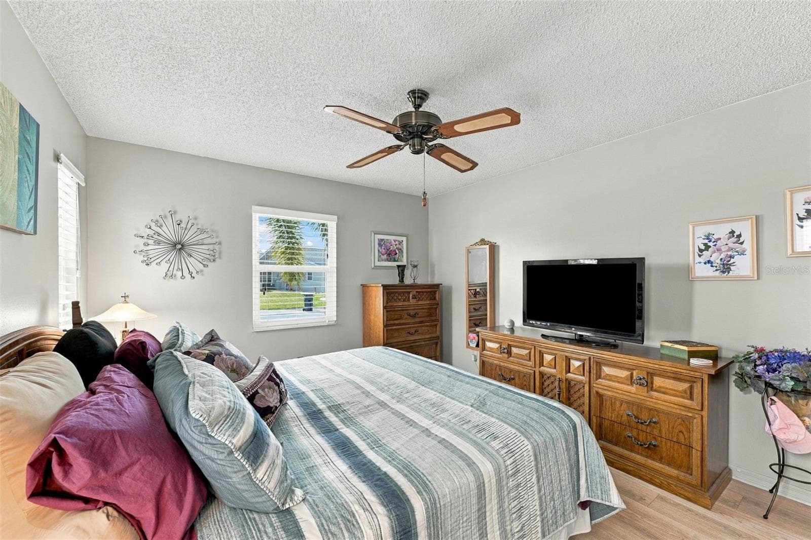 This oversized bedroom is perfect for lots of furniture and a king size bed. - 215 GENET CT, SUN CITY CENTER
