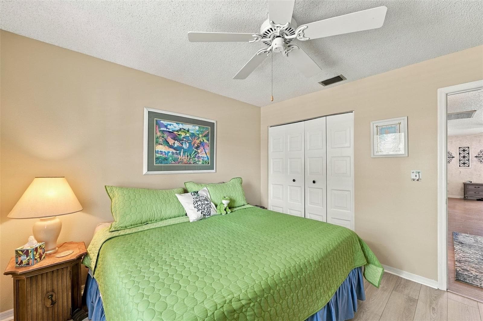 A good size wall closet for storage is perfect for the room. - 215 GENET CT, SUN CITY CENTER