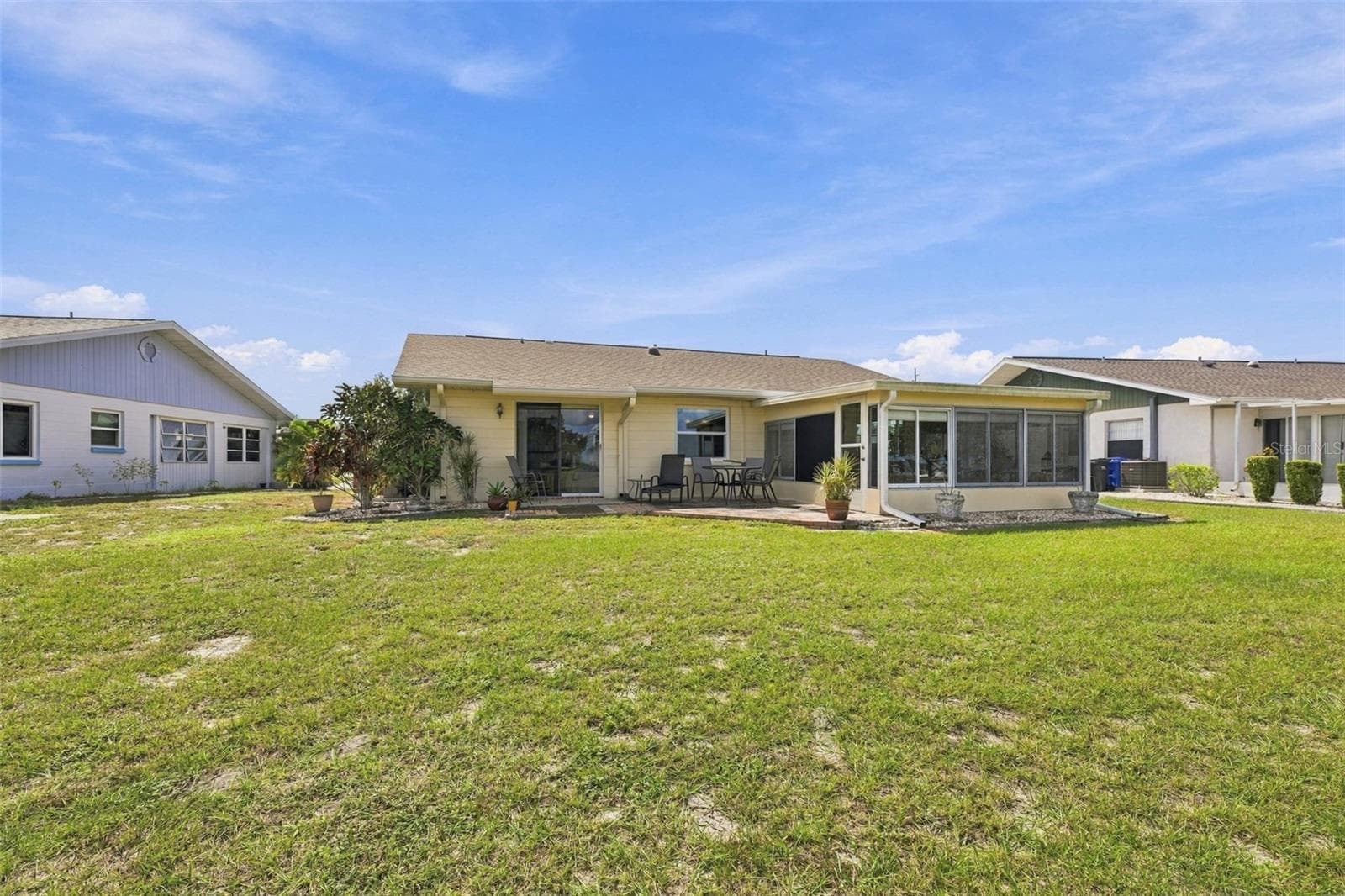 Backyard view of the home. - 215 GENET CT, SUN CITY CENTER