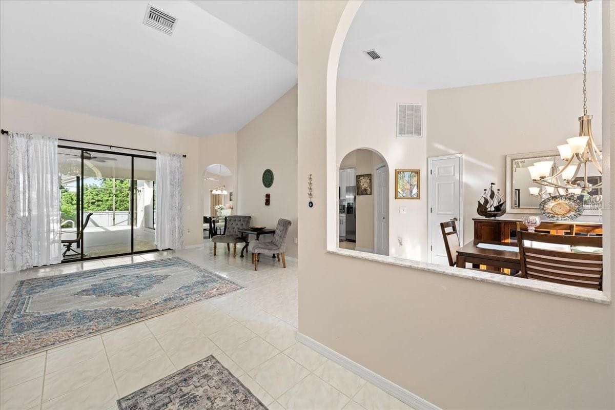 Foyer, Dining and Living Room - 2656 SADDLEWOOD LN, PALM HARBOR