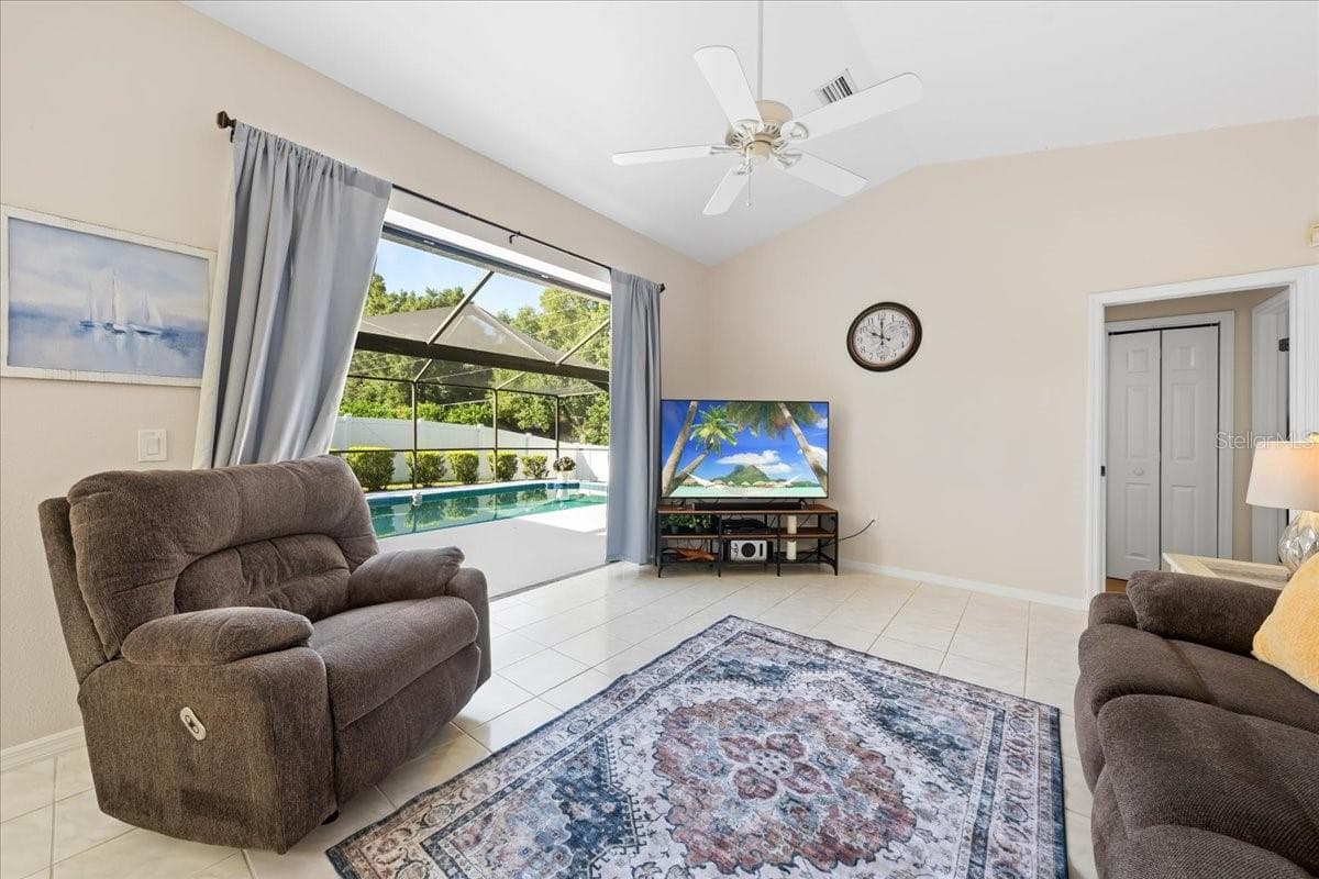 Family Room with Pool View - 2656 SADDLEWOOD LN, PALM HARBOR