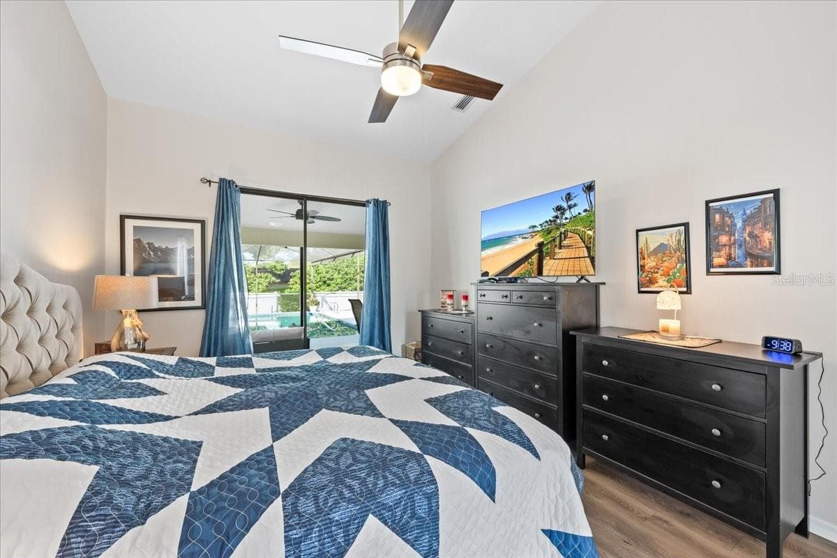 Primary Bedroom with Pool View - 2656 SADDLEWOOD LN, PALM HARBOR
