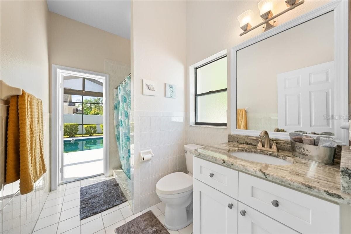 Pool Bathroom - 2656 SADDLEWOOD LN, PALM HARBOR