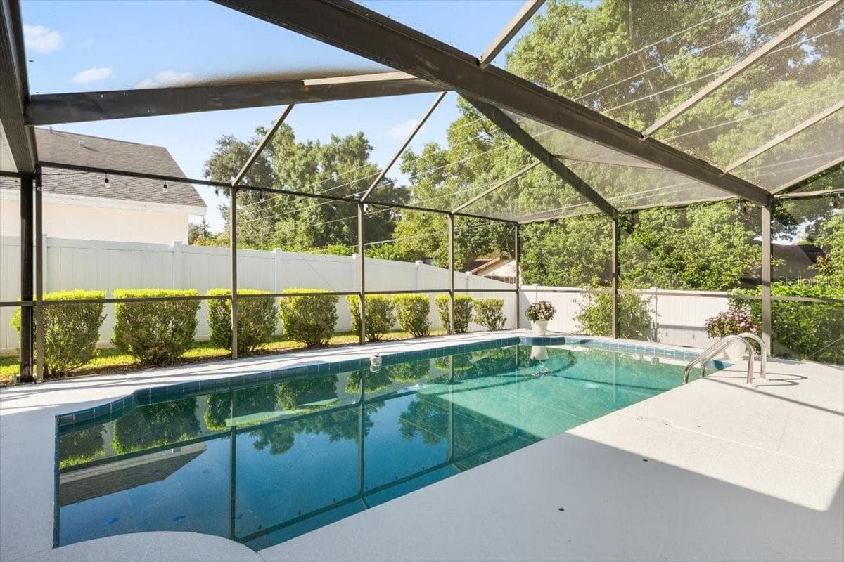 Swimming Pool and Side Yard - 2656 SADDLEWOOD LN, PALM HARBOR