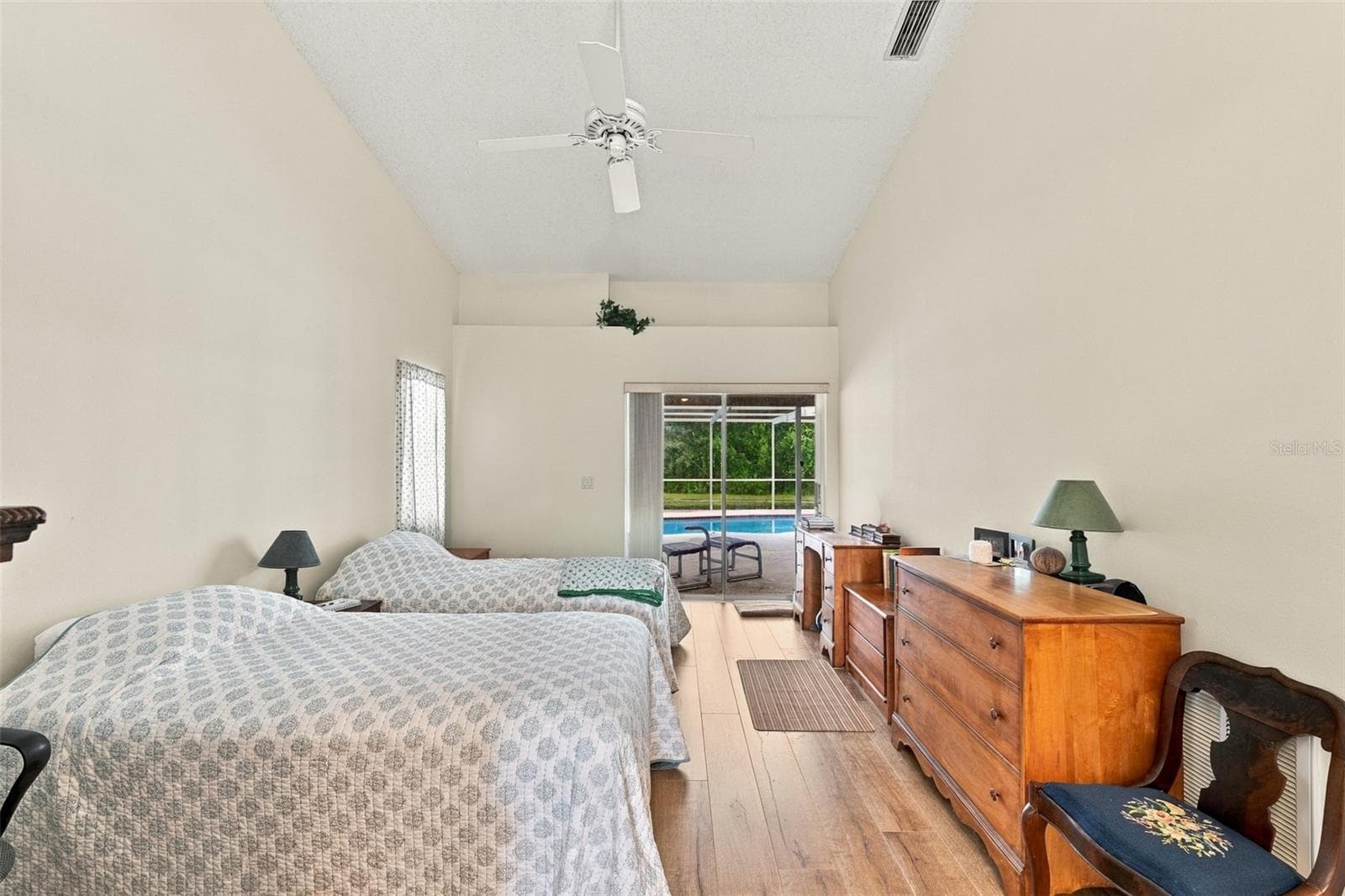 Master Bedroom with access to Pool area - 8657 CYPRESS LAKES BLVD, NEW PORT RICHEY