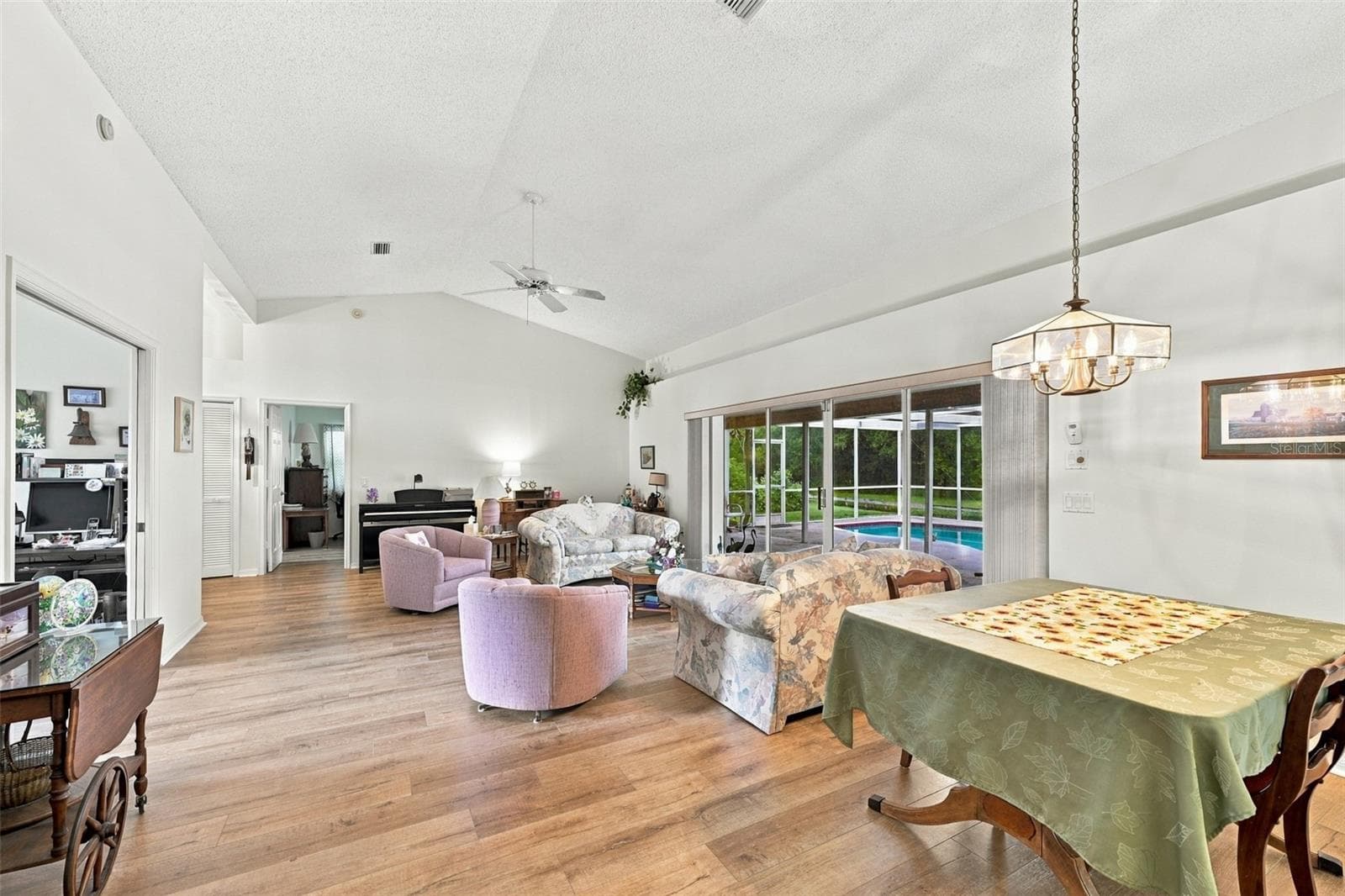 Open area showing dining area, living room area - 8657 CYPRESS LAKES BLVD, NEW PORT RICHEY