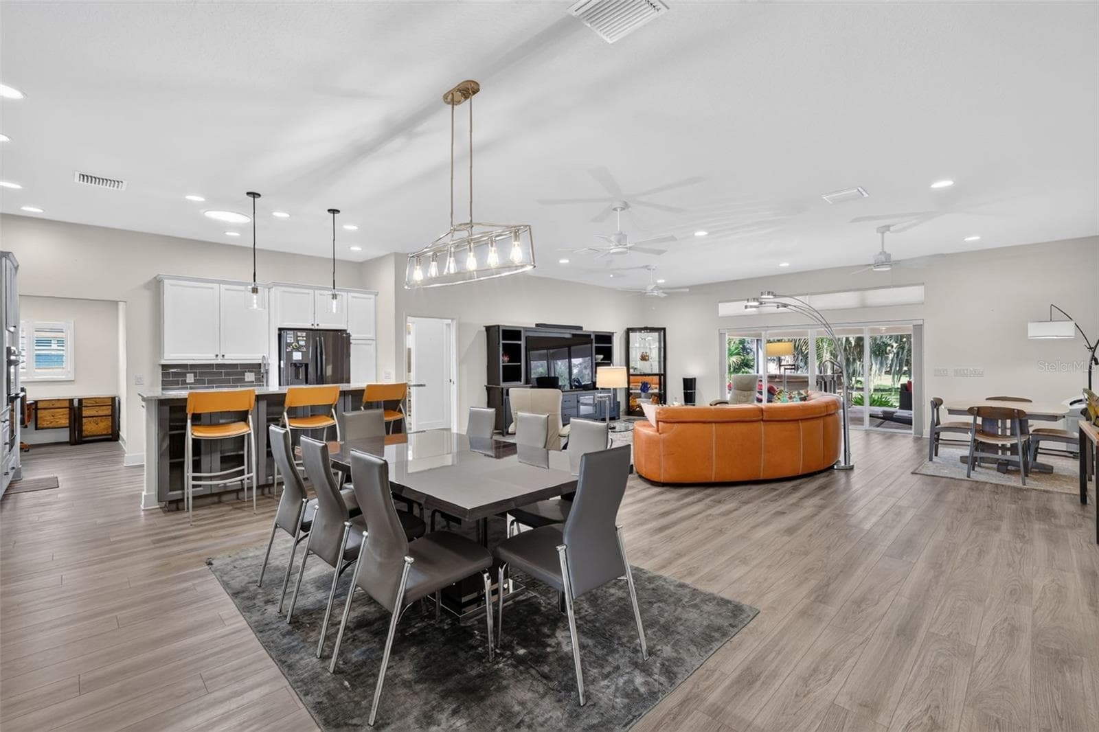 Open-Concept living, dining and kitchen areas - 2741 DUNHAM DR, THE VILLAGES