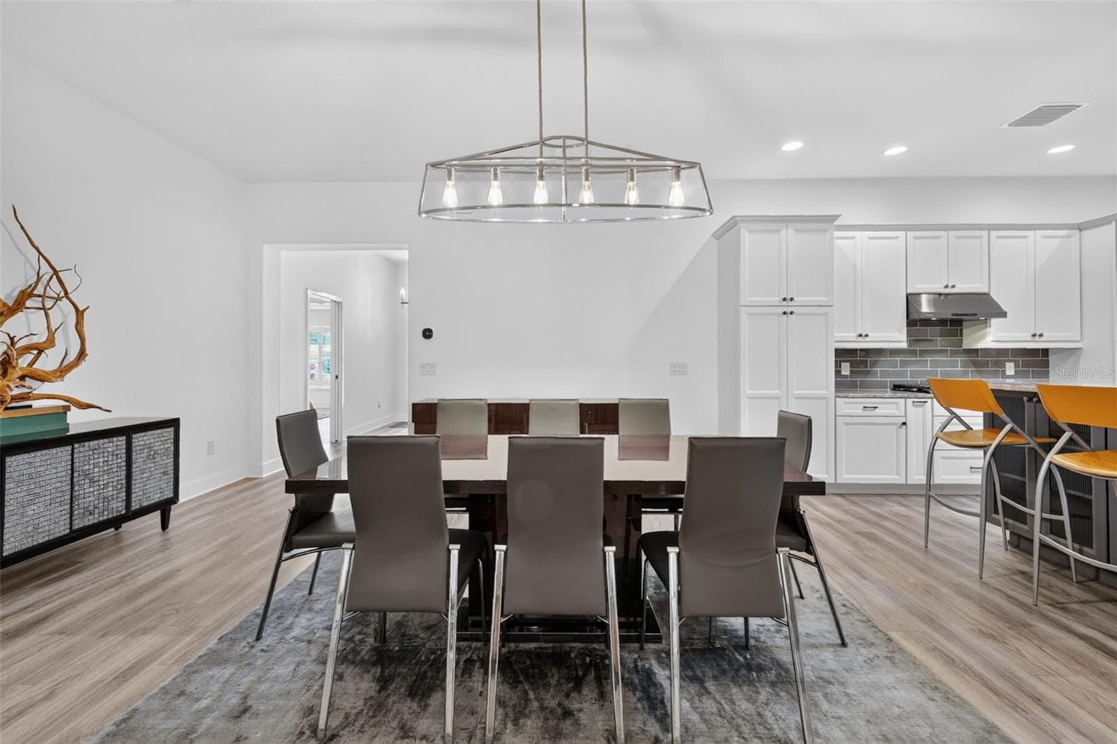 Dining room with view to front entry - 2741 DUNHAM DR, THE VILLAGES