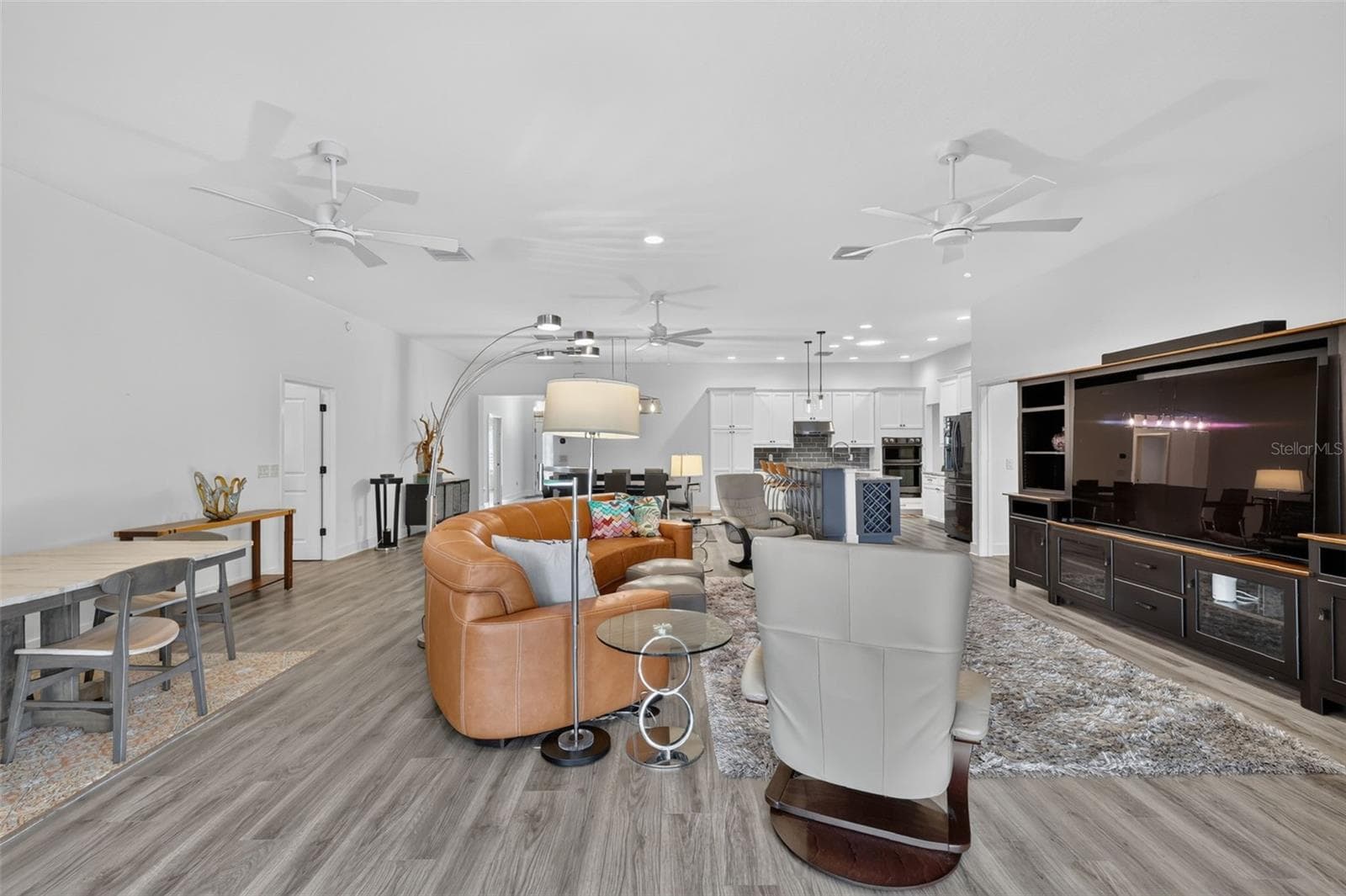 The property has LVP flooring throughout the home - 2741 DUNHAM DR, THE VILLAGES
