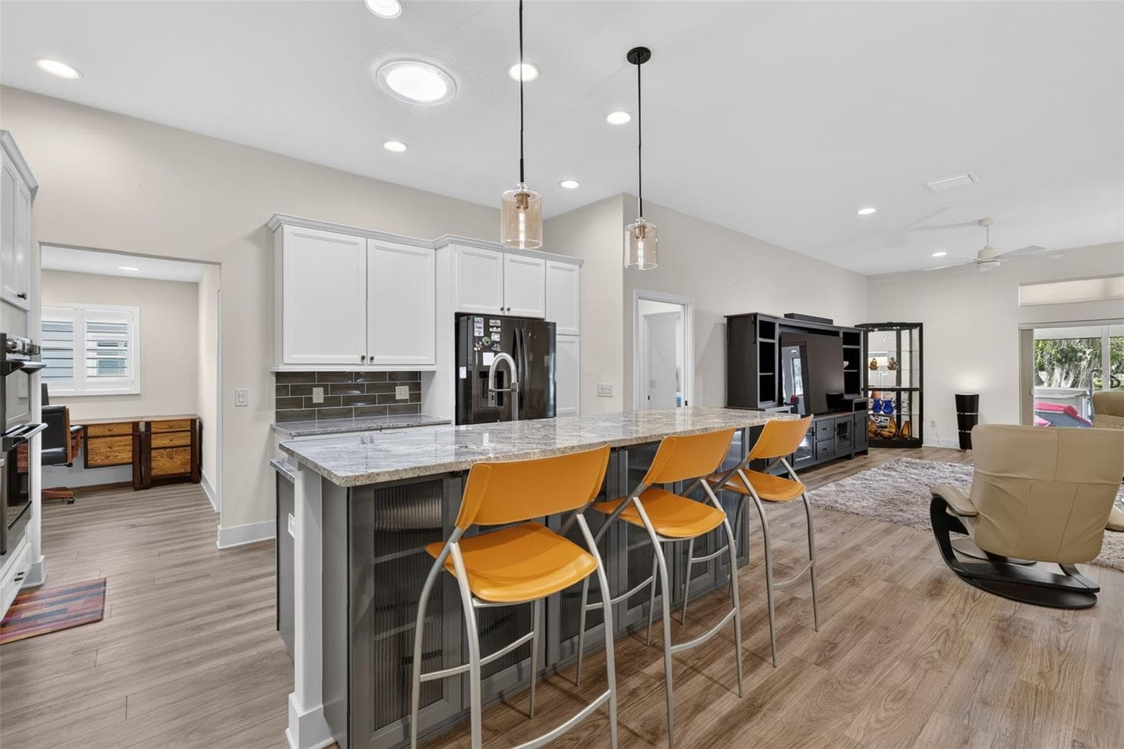 Kitchen with view to the versatile nook, ideal for additional pantry space or a home office - 2741 DUNHAM DR, THE VILLAGES