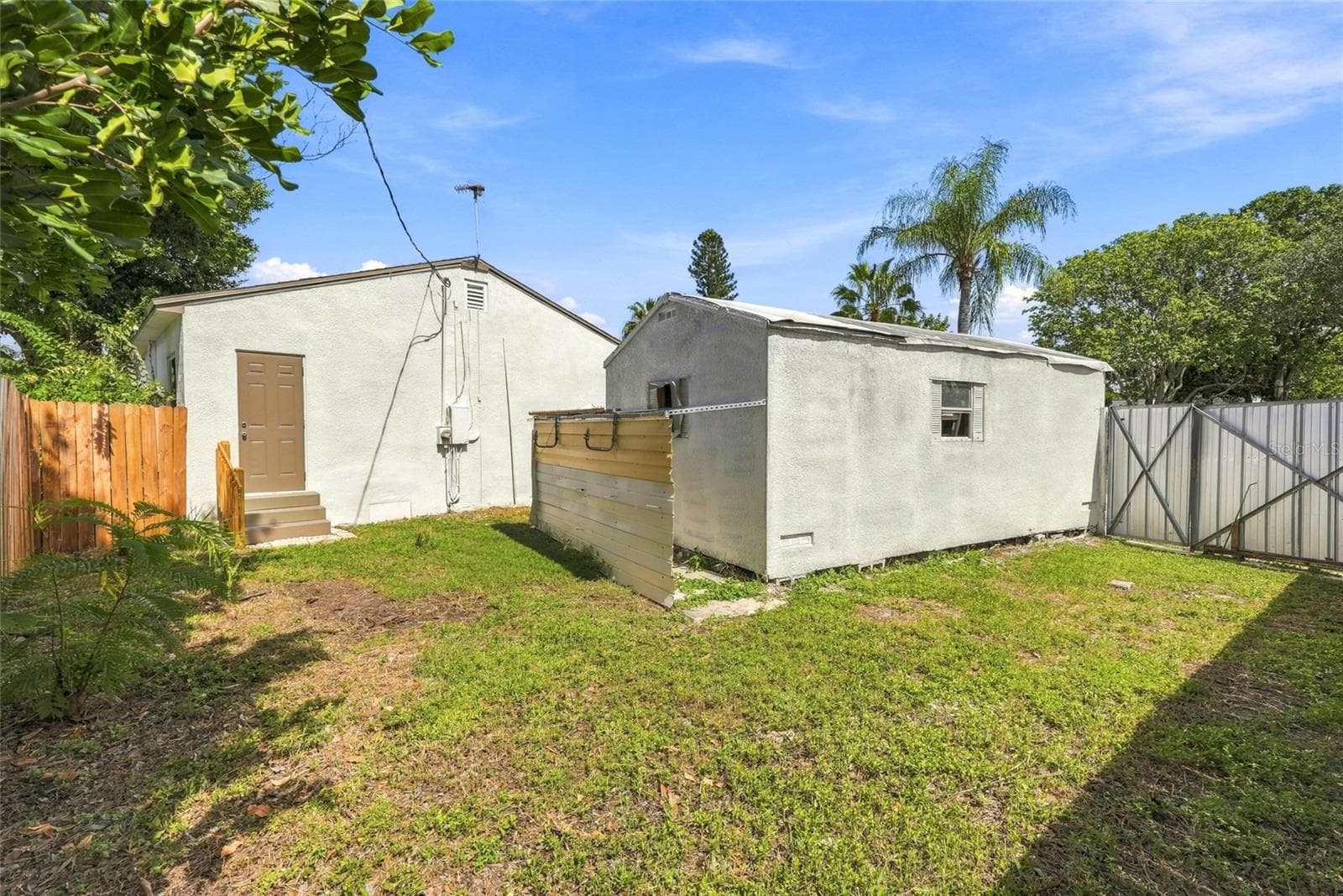 Fenced In Backyard & Trailer Storage - 8474 TOBAY RD N, ST PETERSBURG
