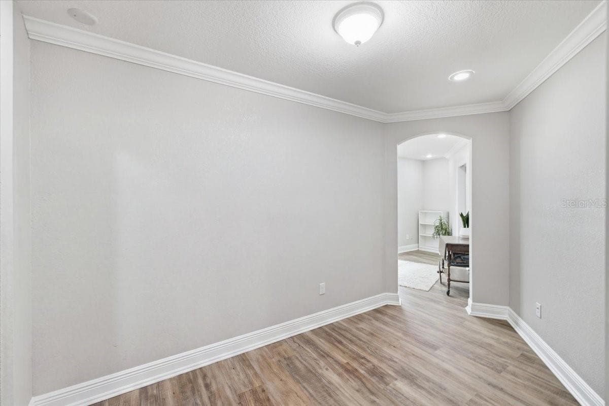 The tunnel from Den to Primary Suite - 1801 ORCHID CT, SUN CITY CENTER