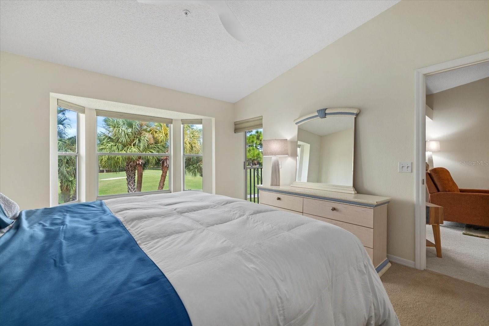 Primary Suite Bay Window & Door to the Screened Lanai - 9580 HIGH GATE DR #1822, SARASOTA