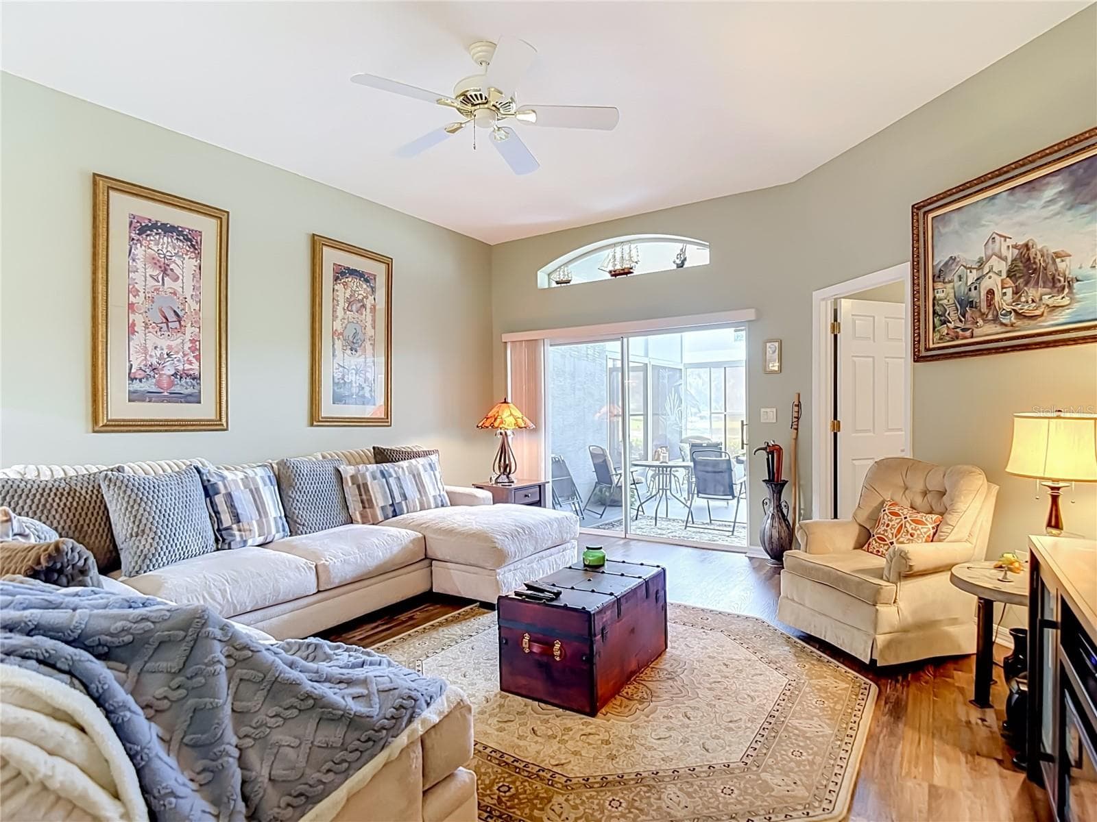The living room has a lot of wall space for pictures etc. to express who you are. - 13424 NORMAN CIR, HUDSON