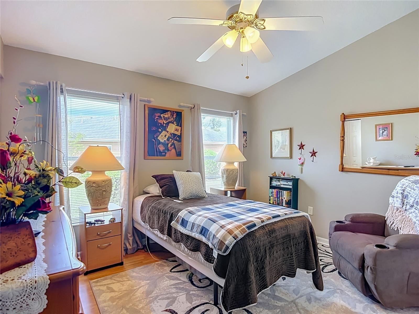 Bedroom 2 presently has a twin bed in place. The 2 windows give you a lot of that natural lighting again. - 13424 NORMAN CIR, HUDSON