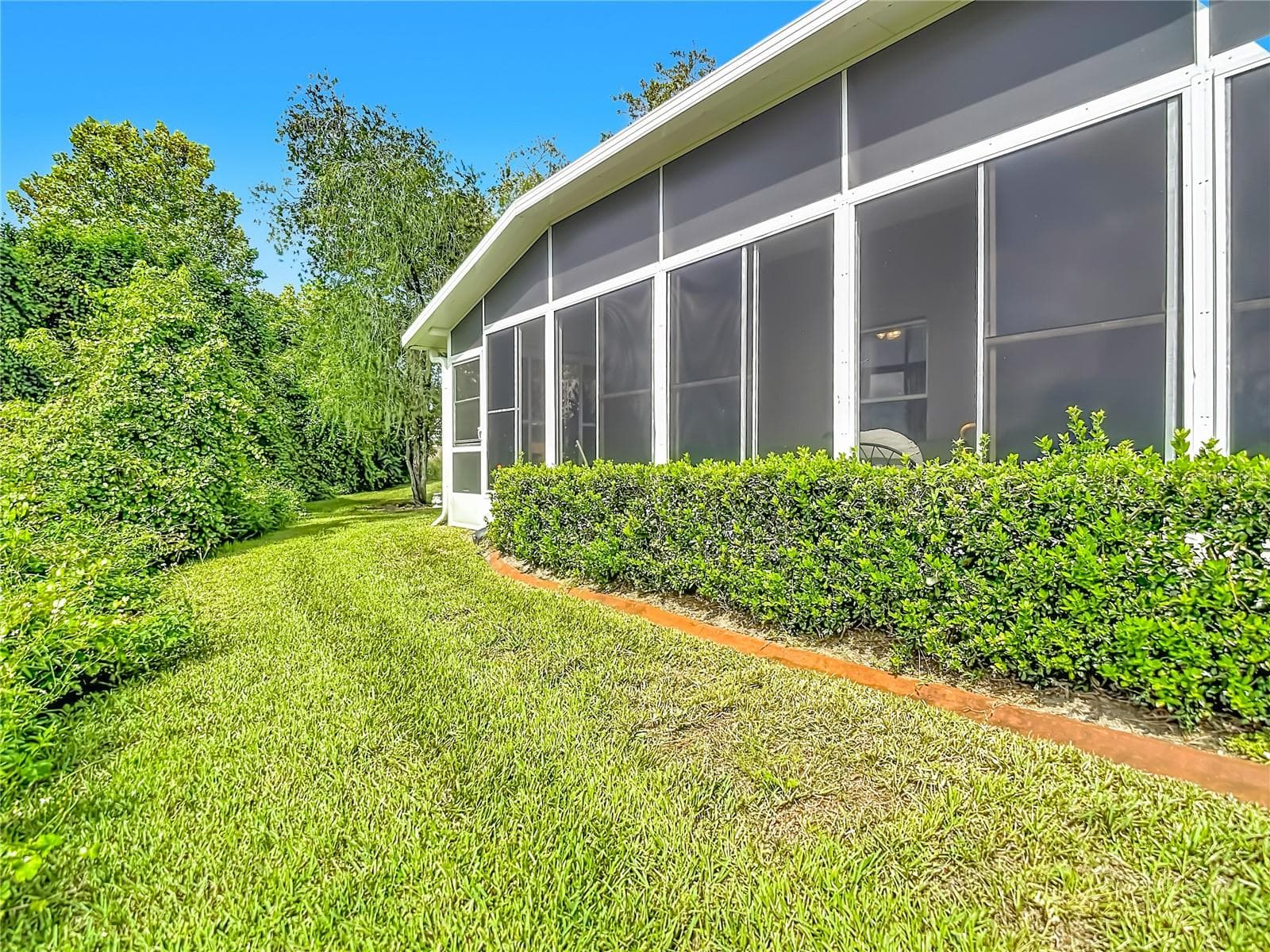 Rear side of the villa. - 13424 NORMAN CIR, HUDSON