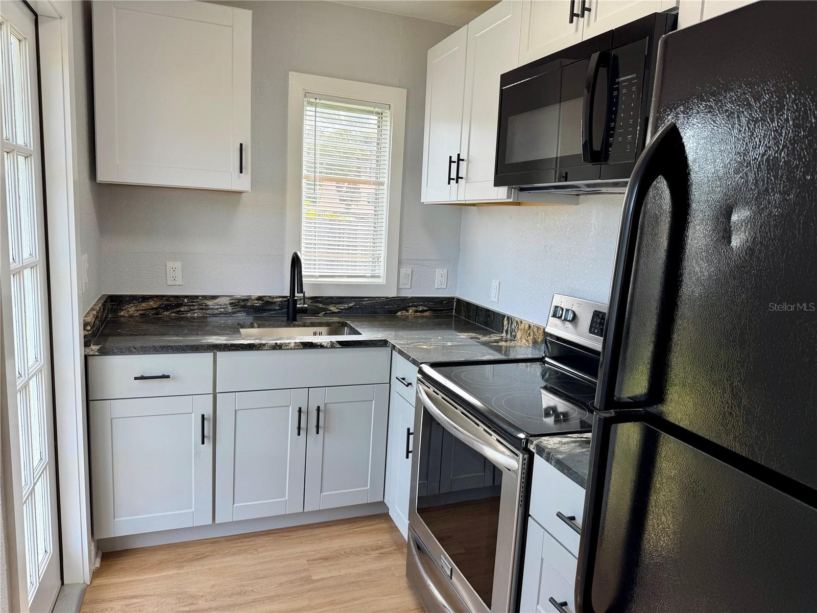 Duplex at 301 80TH AVE NE, ST PETERSBURG, photo 4 of 44