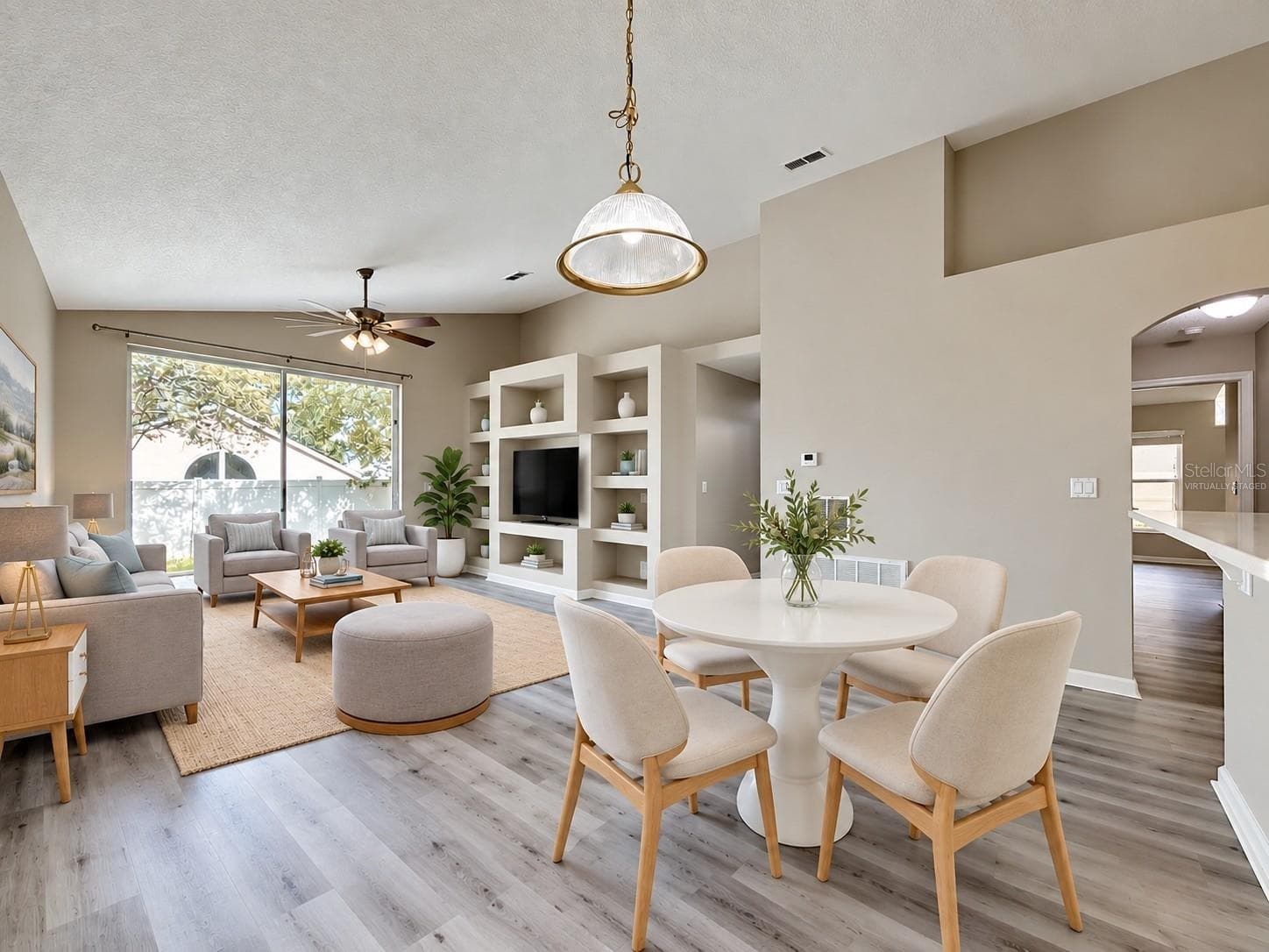 Virtually staged dinette and family room - 2712 WILSHIRE RD, CLERMONT