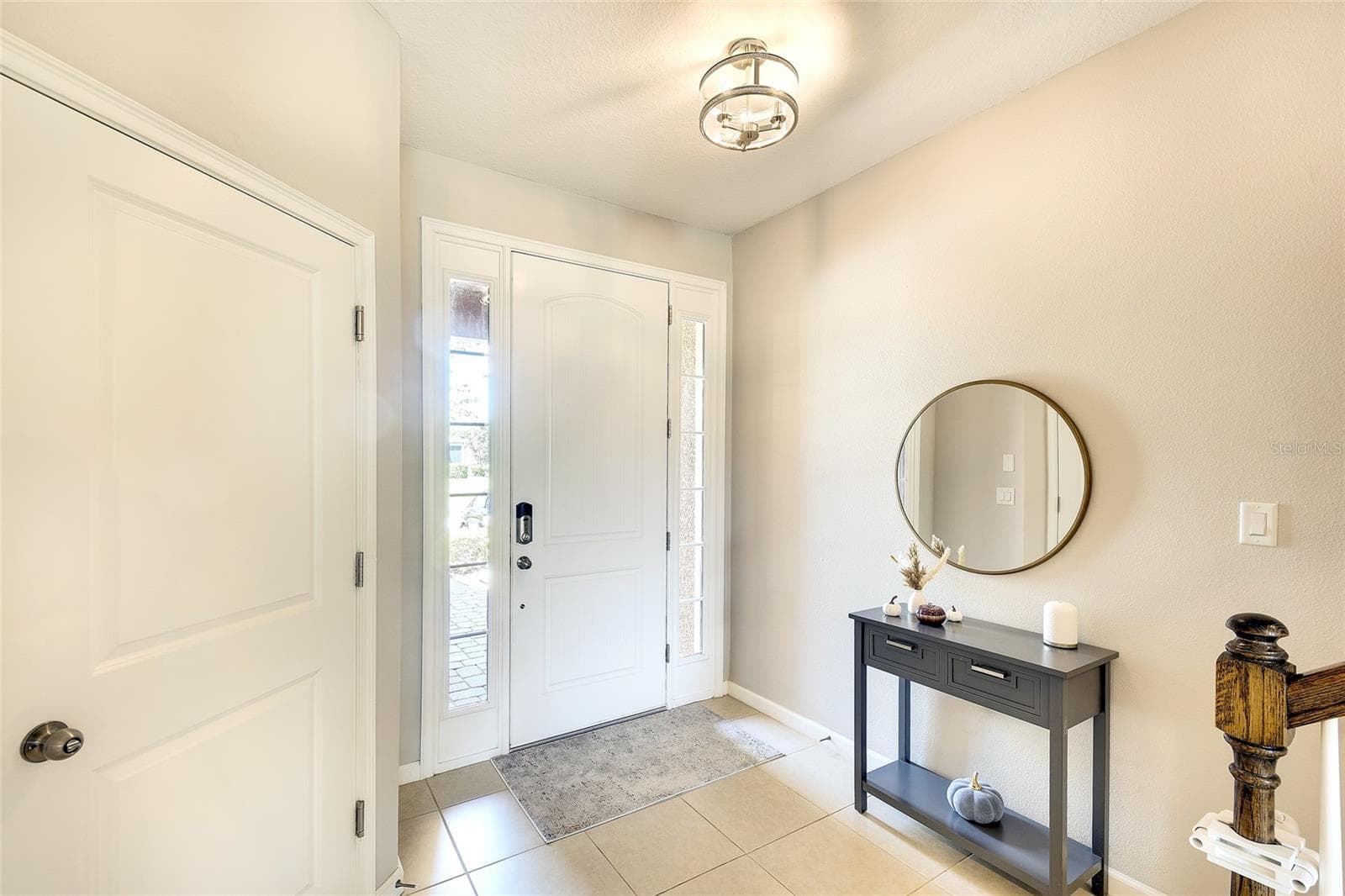 Beautiful foyer area and entry from garage - 12207 TRAILHEAD DR, BRADENTON