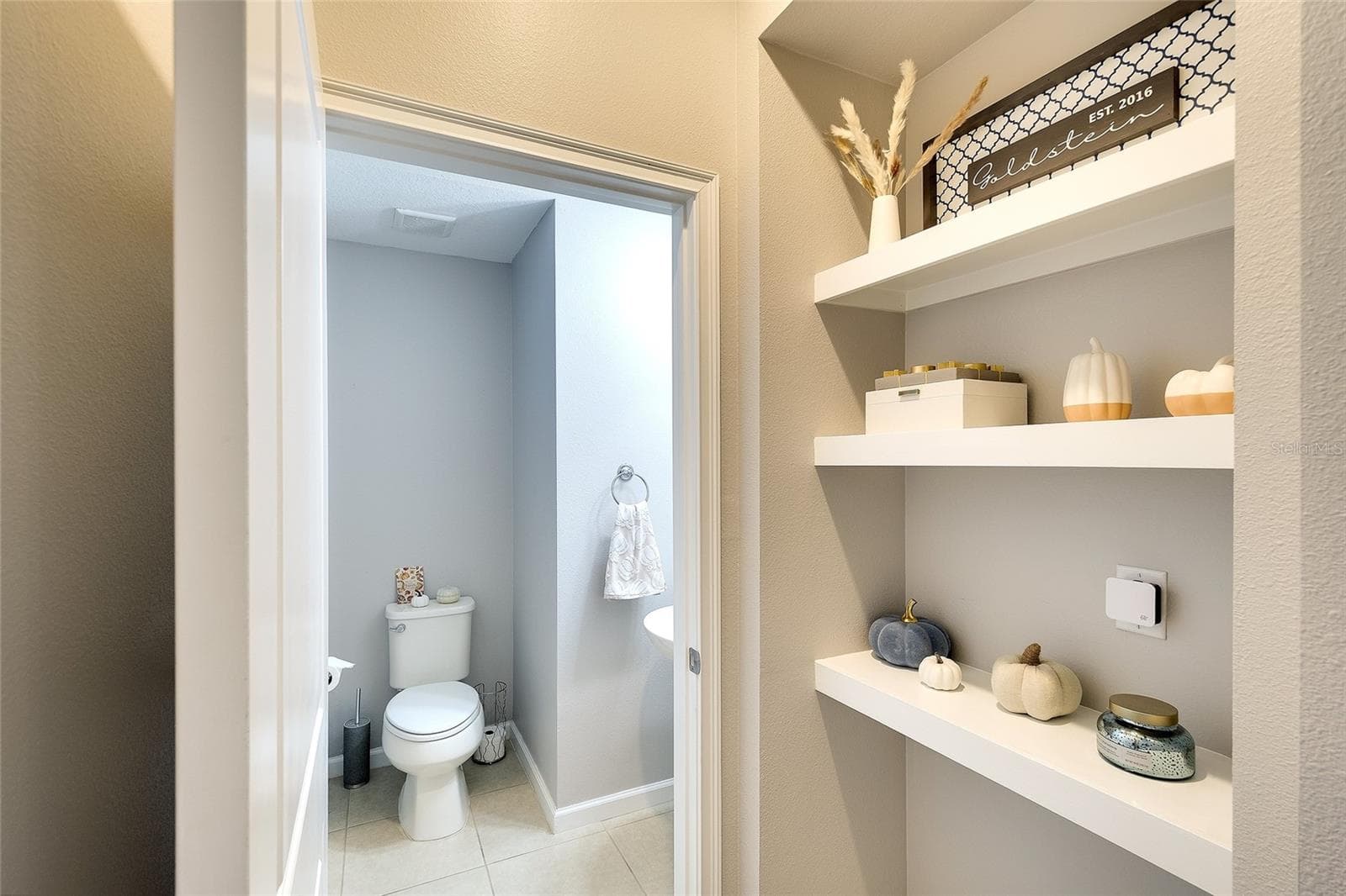 Half bath on the main floor - 12207 TRAILHEAD DR, BRADENTON