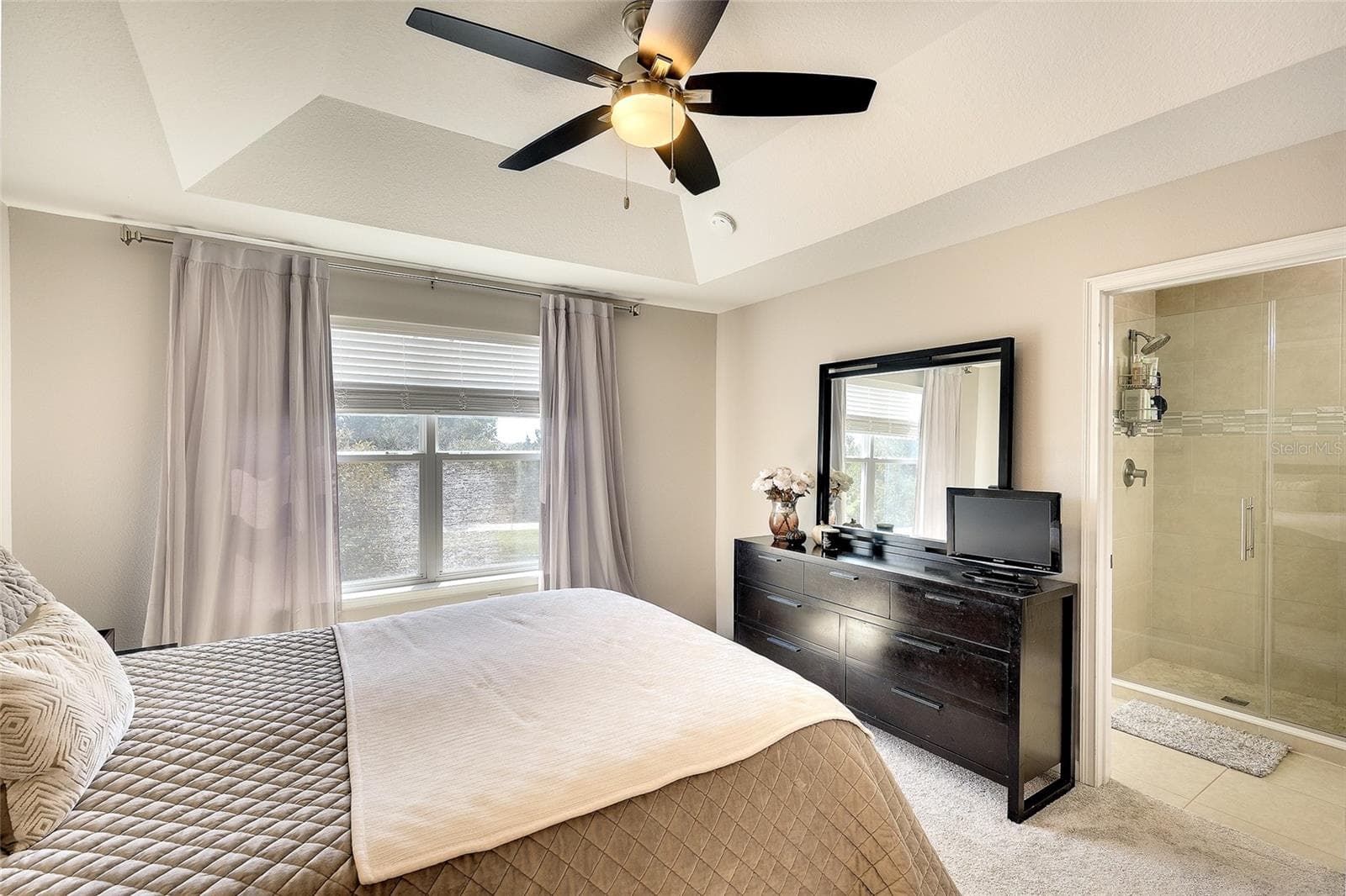 Primary bedroom with lots of natural light - 12207 TRAILHEAD DR, BRADENTON